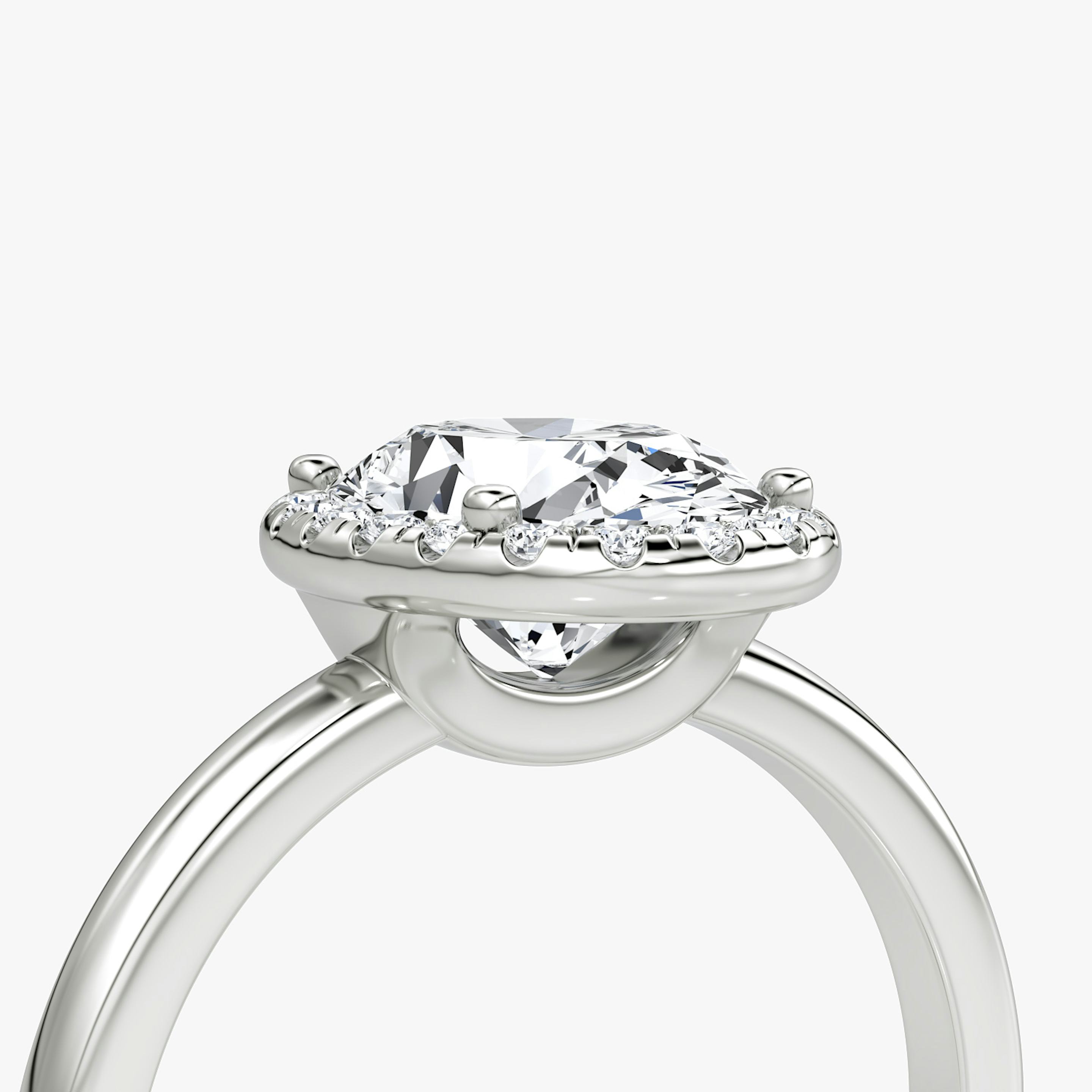 The Halo | Oval | Platinum | Halo: Original | Band: Plain | Diamond orientation: vertical | Carat weight: See full inventory