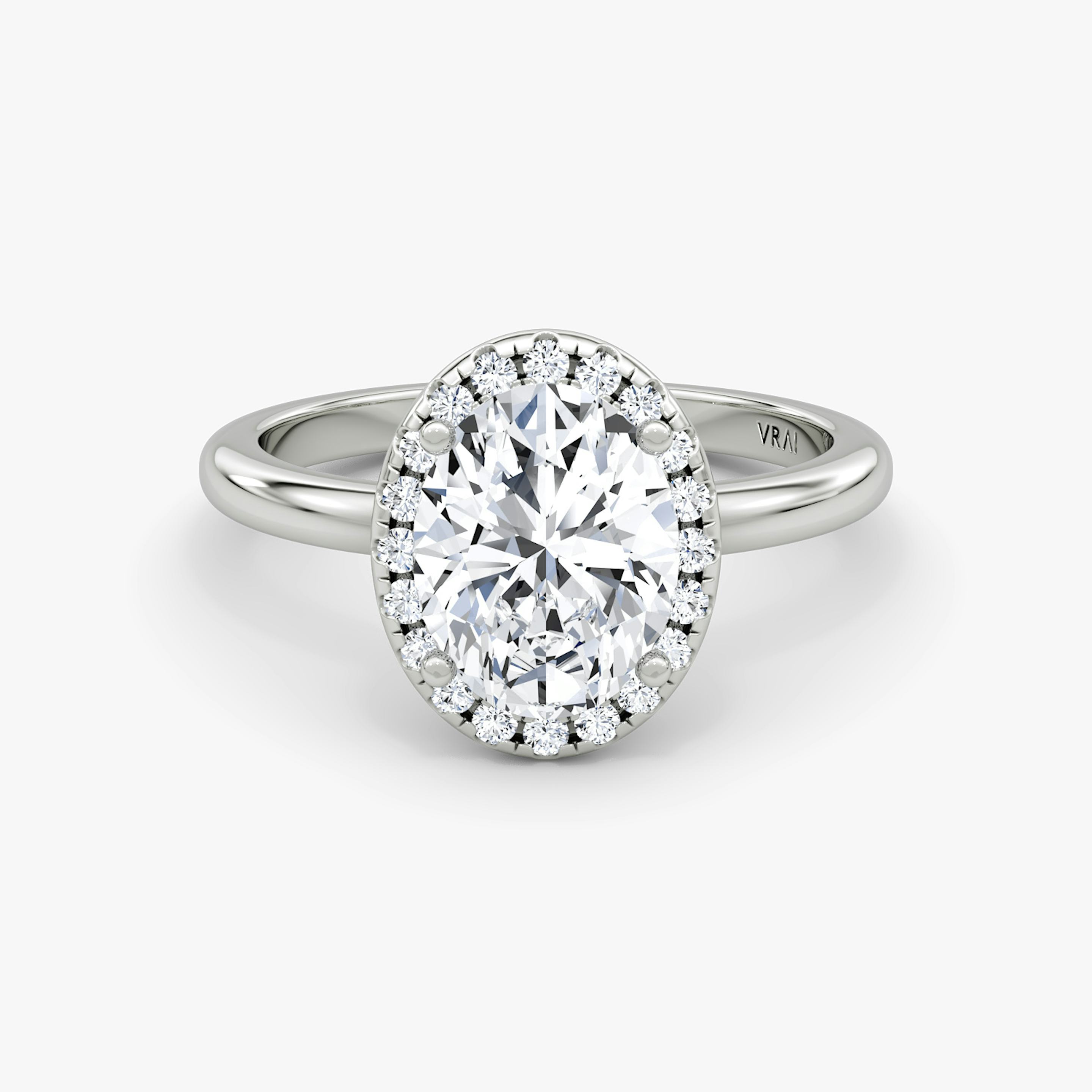 The Halo | Oval | Platinum | Halo: Original | Band: Plain | Diamond orientation: vertical | Carat weight: See full inventory