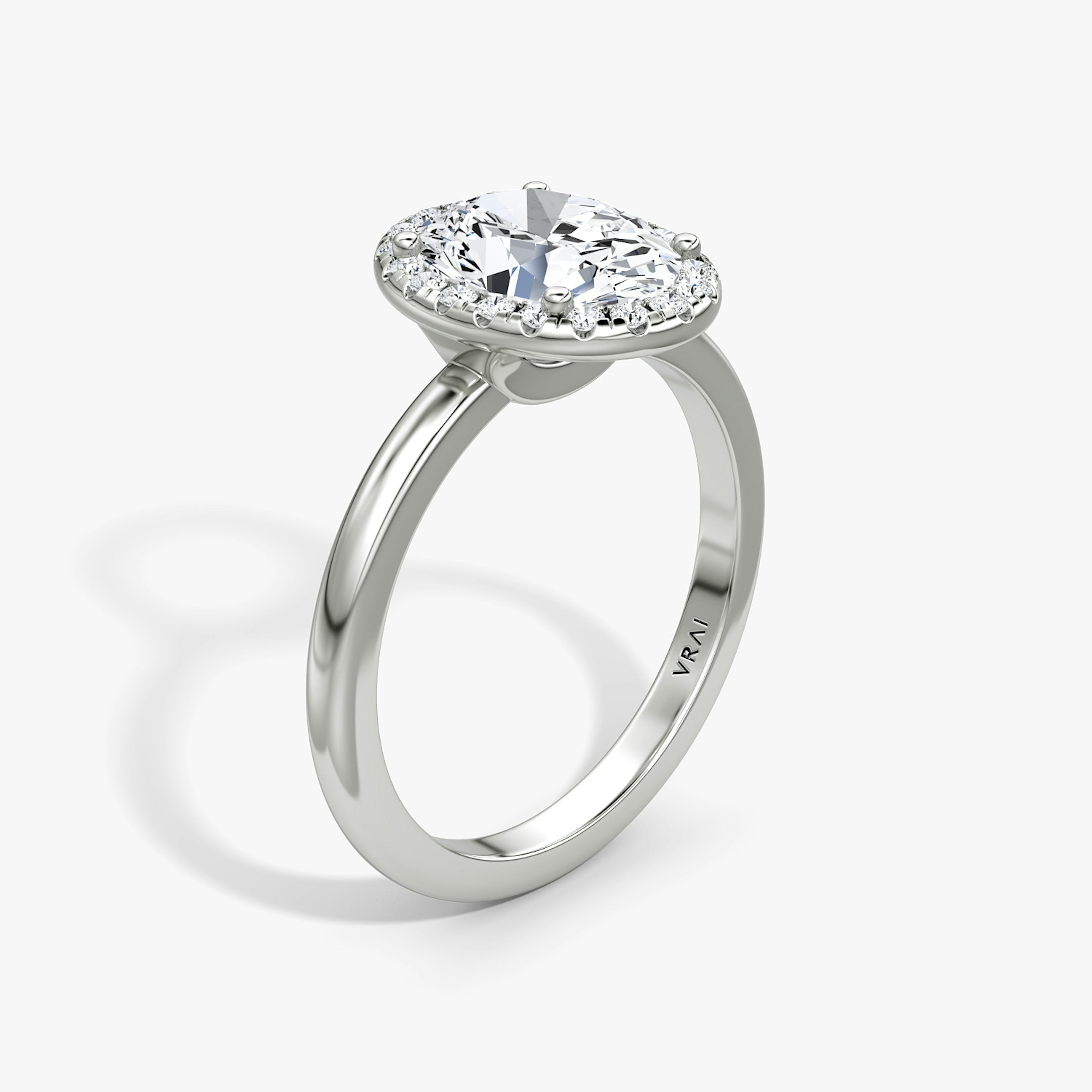 The Halo | Oval | 18k | 18k White Gold | Halo: Original | Band: Plain | Diamond orientation: vertical | Carat weight: See full inventory