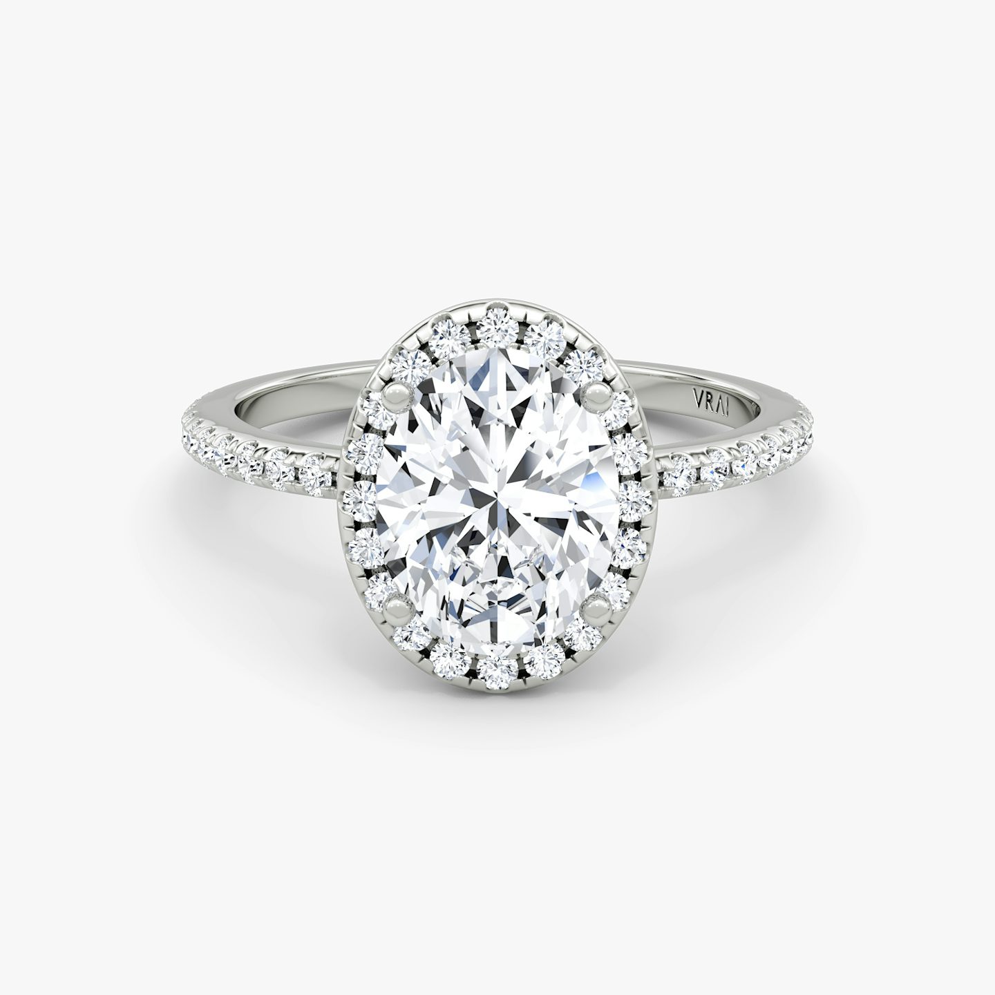 The Halo | Oval | 18k | 18k White Gold | Halo: Original | Band: Pavé | Diamond orientation: vertical | Carat weight: See full inventory