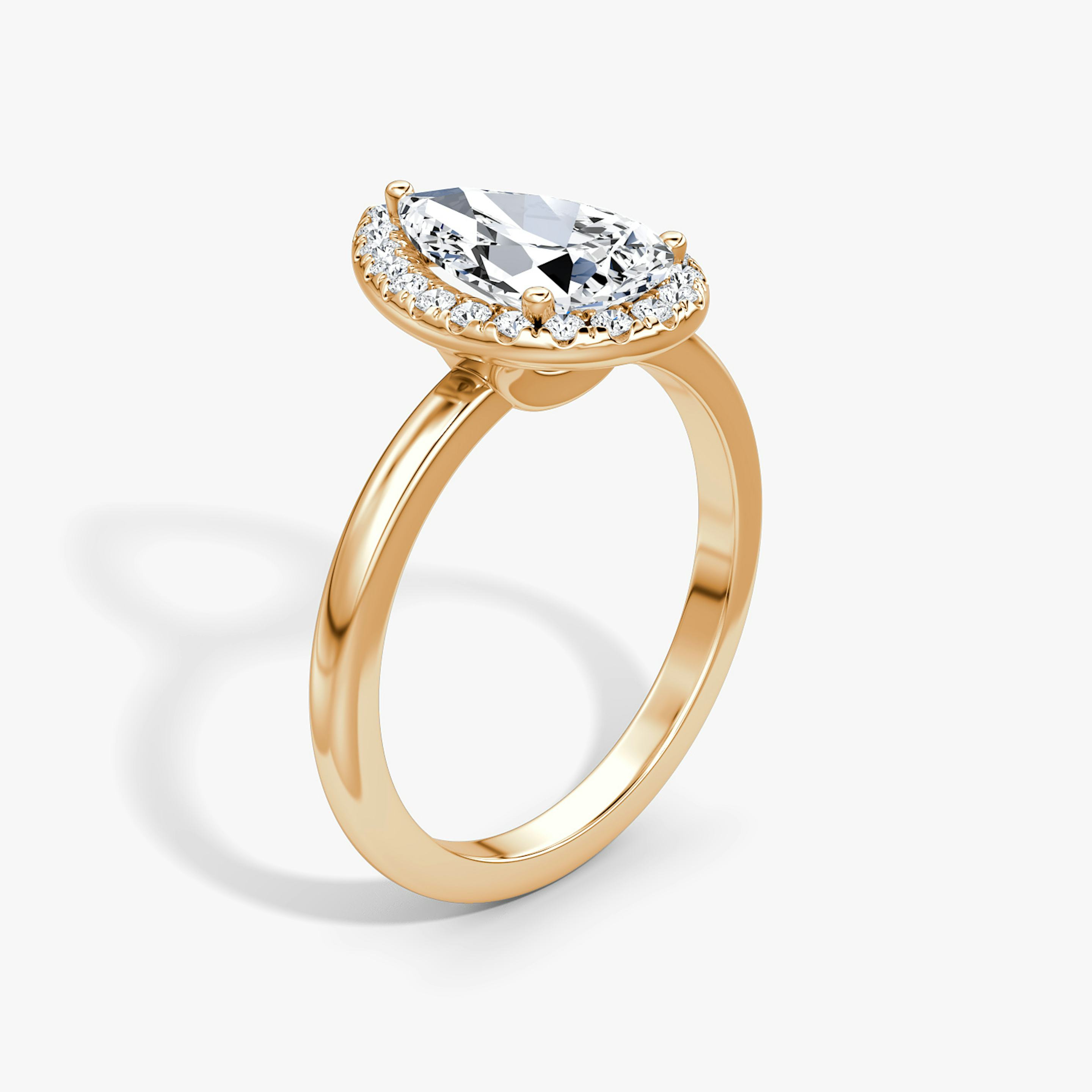 The Halo | Pear | 14k | 14k Rose Gold | Halo: Original | Band: Plain | Diamond orientation: vertical | Carat weight: See full inventory