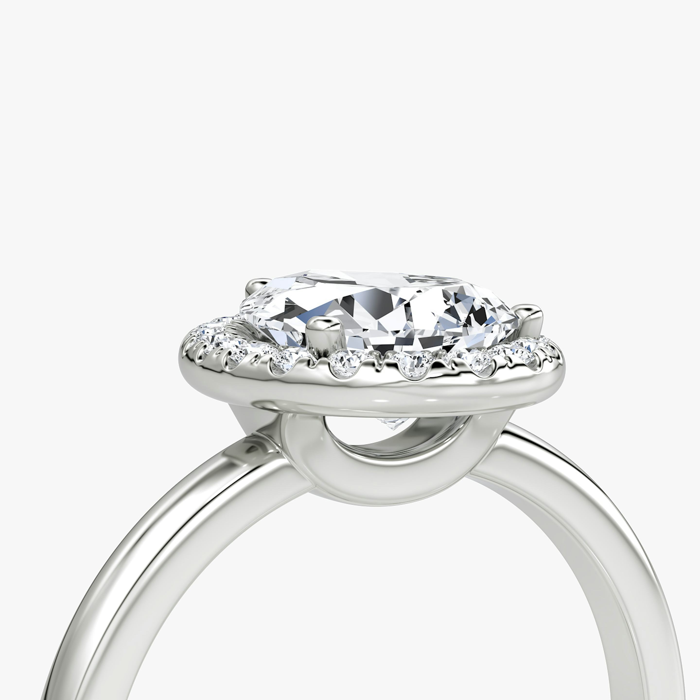 The Halo | Pear | 18k | 18k White Gold | Halo: Original | Band: Plain | Diamond orientation: vertical | Carat weight: See full inventory
