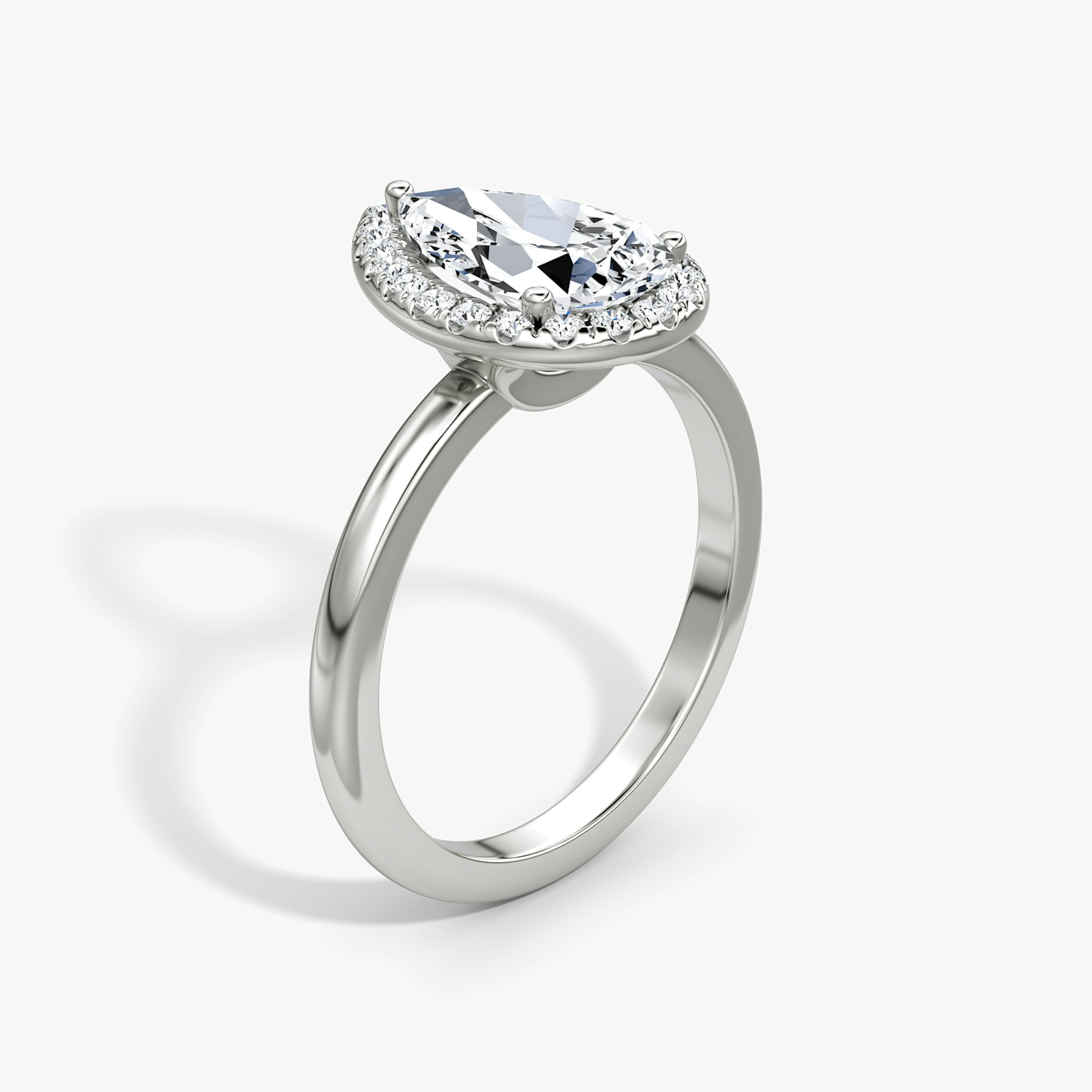 The Halo | Pear | 18k | 18k White Gold | Halo: Original | Band: Plain | Diamond orientation: vertical | Carat weight: See full inventory