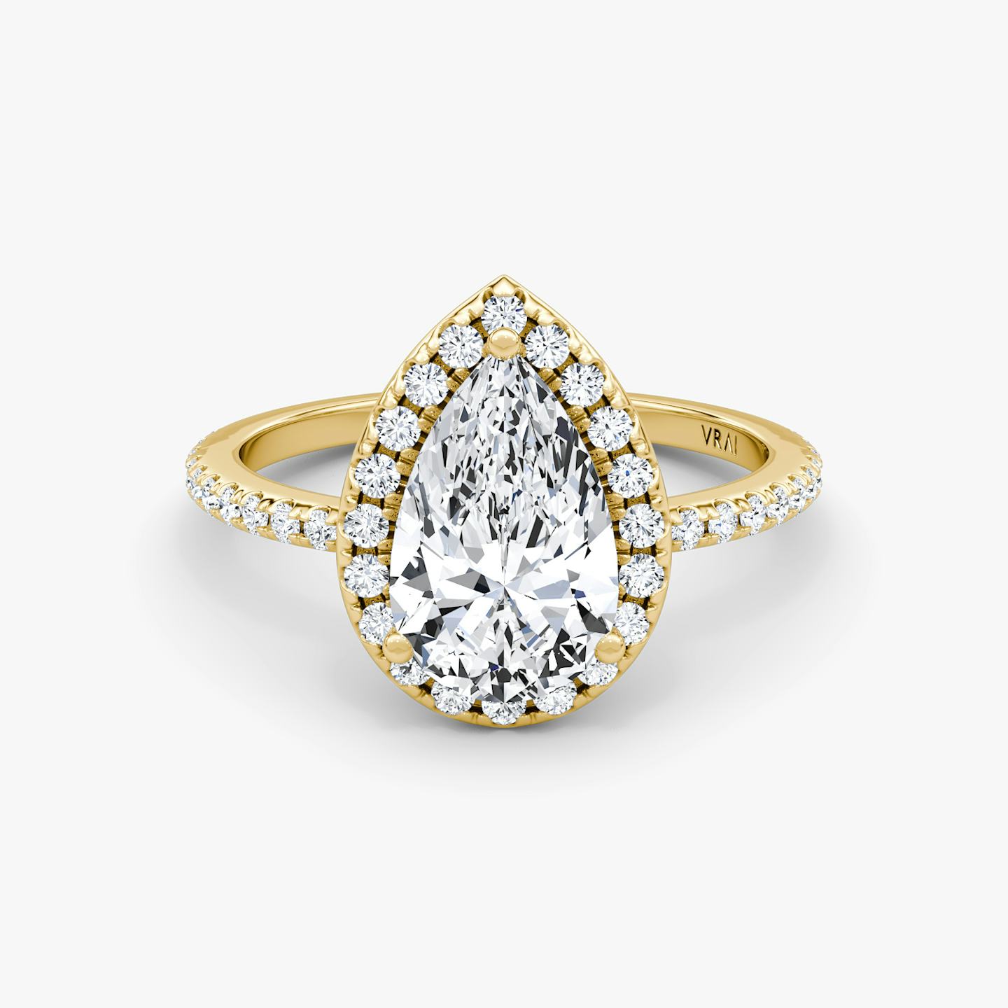The Halo | Pear | 18k | 18k Yellow Gold | Halo: Original | Band: Pavé | Diamond orientation: vertical | Carat weight: See full inventory
