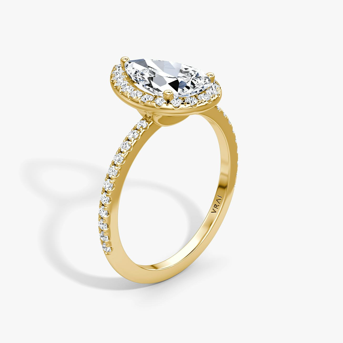 The Halo | Pear | 18k | 18k Yellow Gold | Halo: Original | Band: Pavé | Diamond orientation: vertical | Carat weight: See full inventory