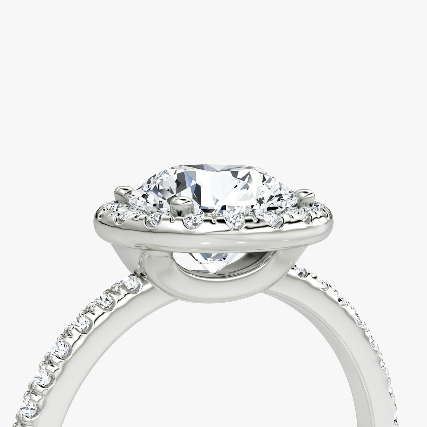The Halo | Round Brilliant | 18k | 18k White Gold | Halo: Original | Band: Pavé | Carat weight: See full inventory | Diamond orientation: vertical