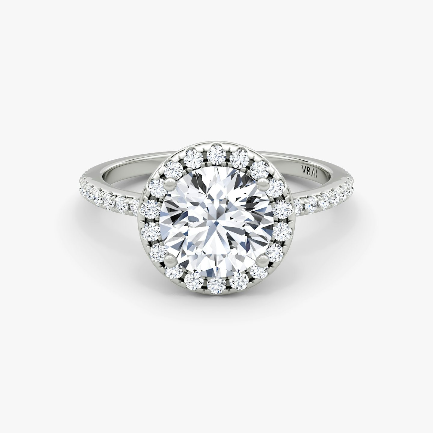 The Halo | Round Brilliant | 18k | 18k White Gold | Halo: Original | Band: Pavé | Carat weight: See full inventory | Diamond orientation: vertical