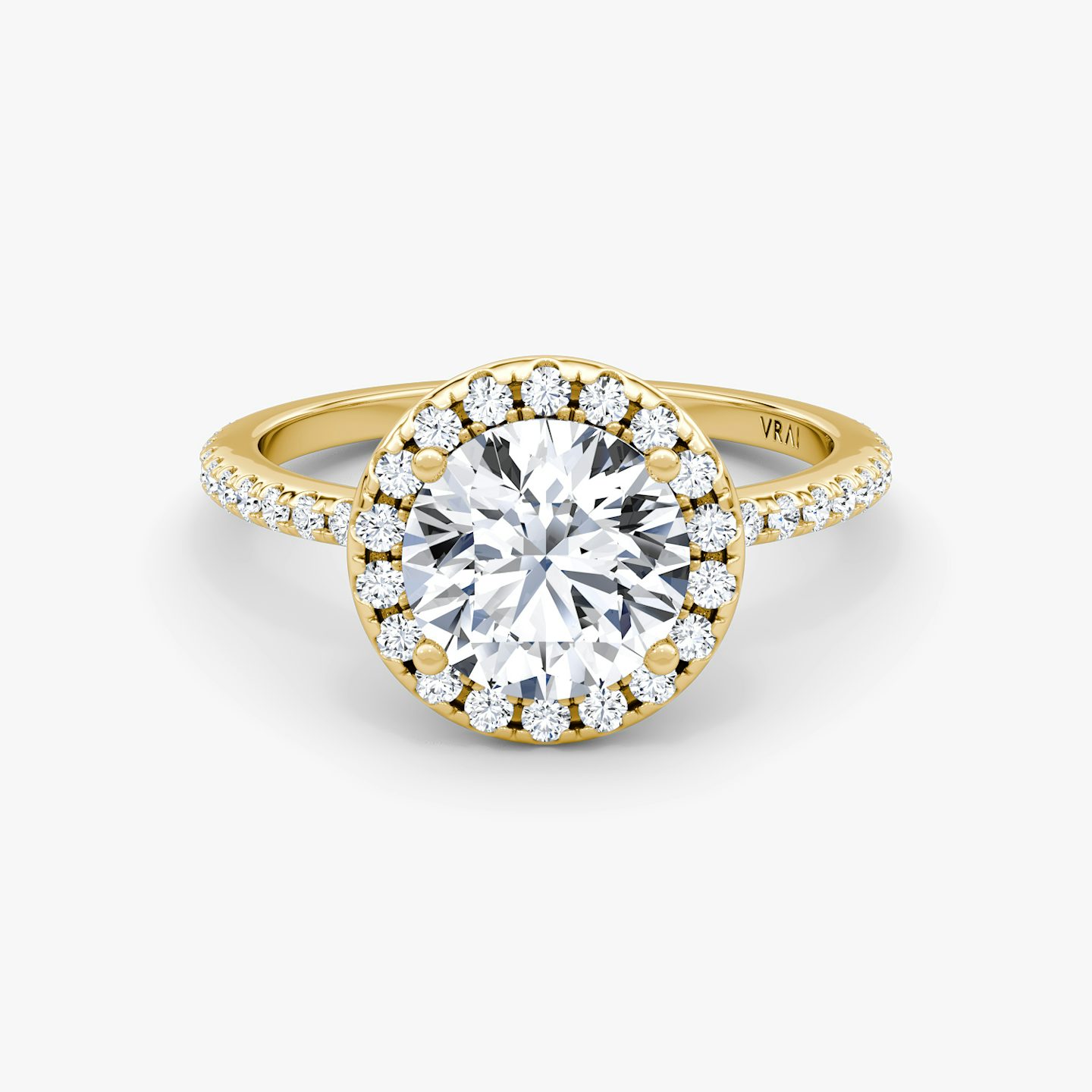 The Halo | Round Brilliant | 18k | 18k Yellow Gold | Halo: Original | Band: Pavé | Carat weight: See full inventory | Diamond orientation: vertical