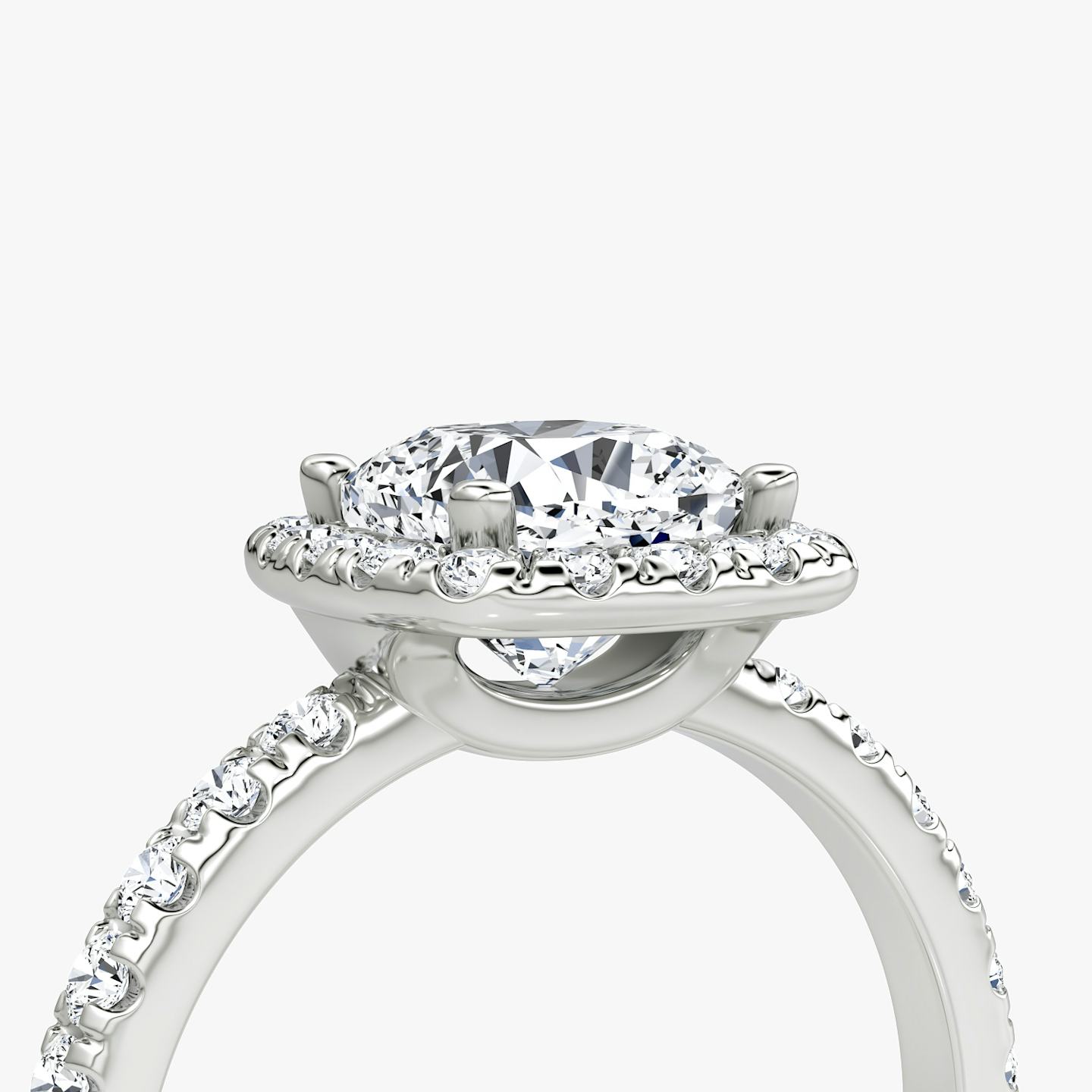 The Halo | Pavé Cushion | Platinum | Halo: Large | Band: Pavé | Diamond orientation: vertical | Carat weight: See full inventory