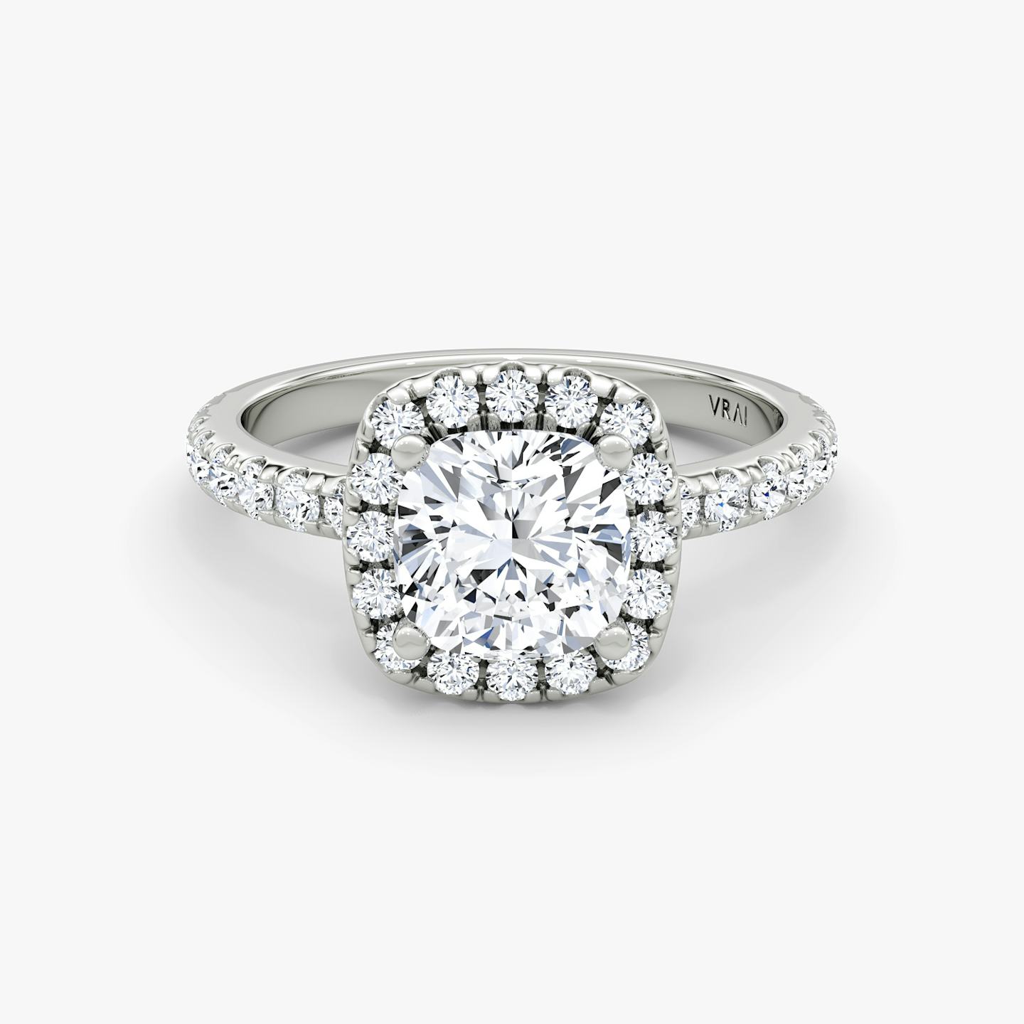 The Halo | Pavé Cushion | Platinum | Halo: Large | Band: Pavé | Diamond orientation: vertical | Carat weight: See full inventory