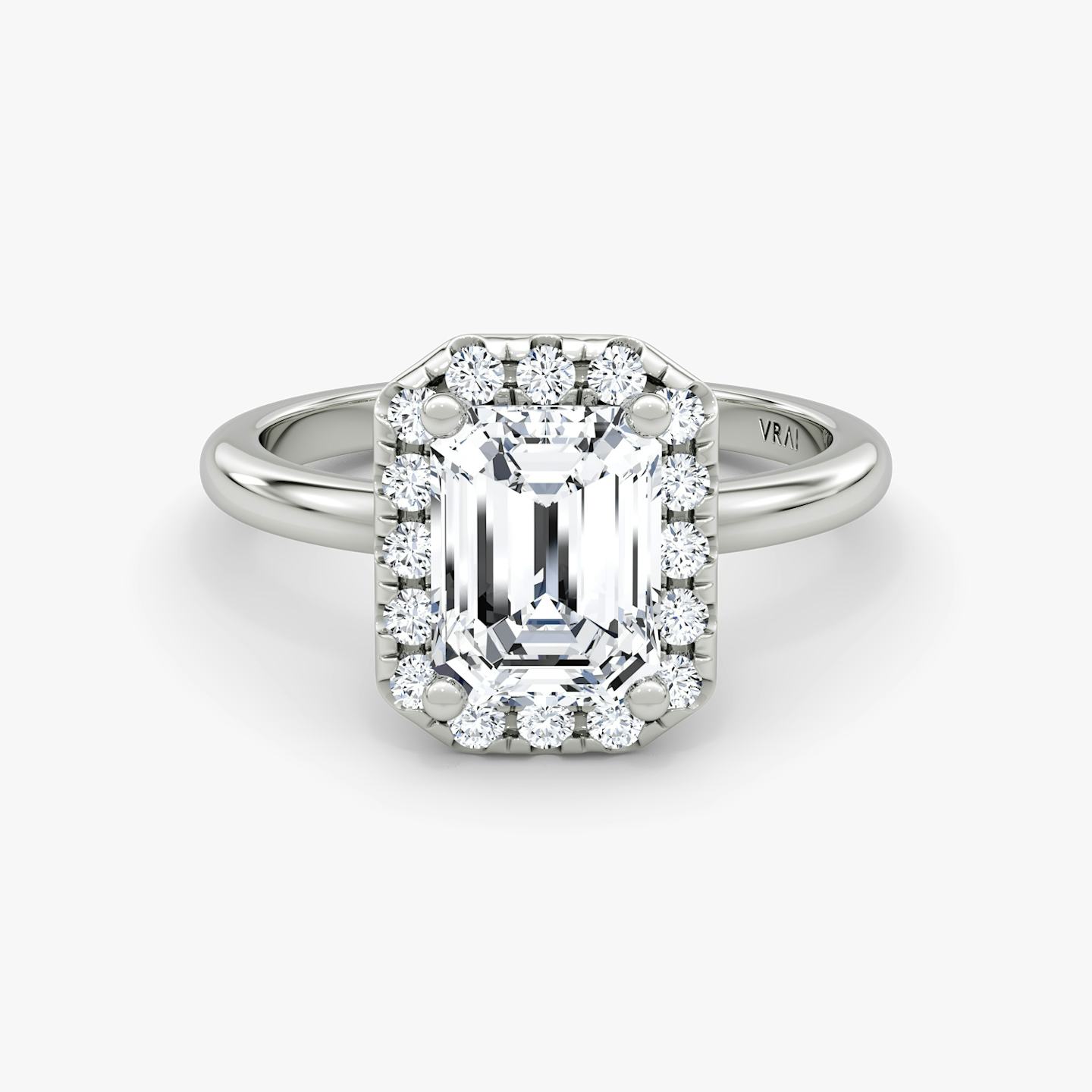 The Halo | Emerald | Platinum | Halo: Large | Band: Plain | Diamond orientation: vertical | Carat weight: See full inventory