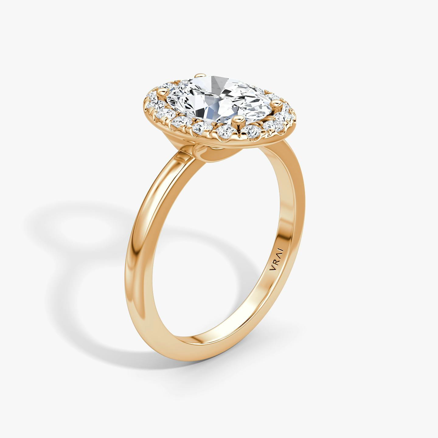 The Halo | Oval | 14k | 14k Rose Gold | Halo: Large | Band: Plain | Diamond orientation: vertical | Carat weight: See full inventory