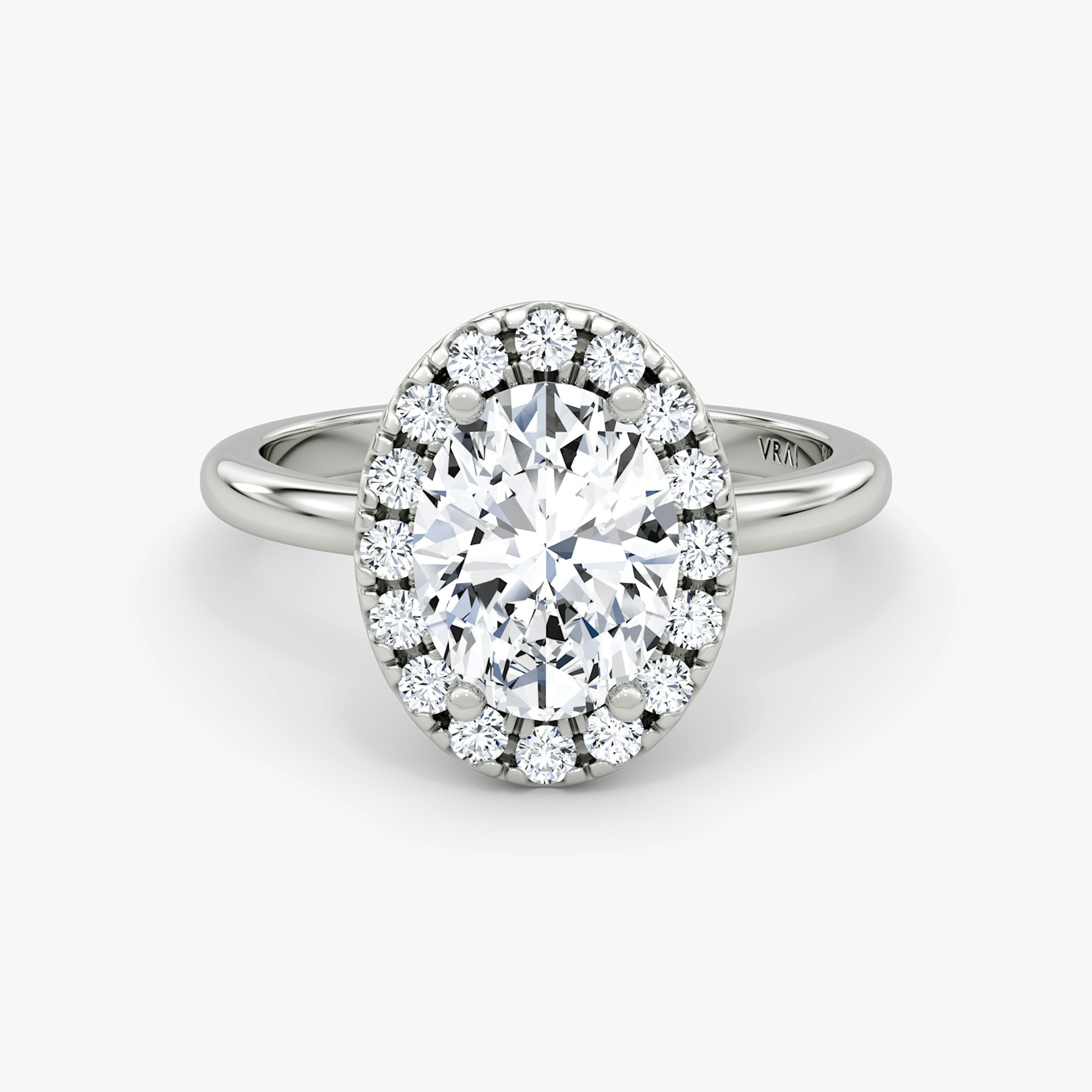 The Halo | Oval | Platinum | Halo: Large | Band: Plain | Diamond orientation: vertical | Carat weight: See full inventory
