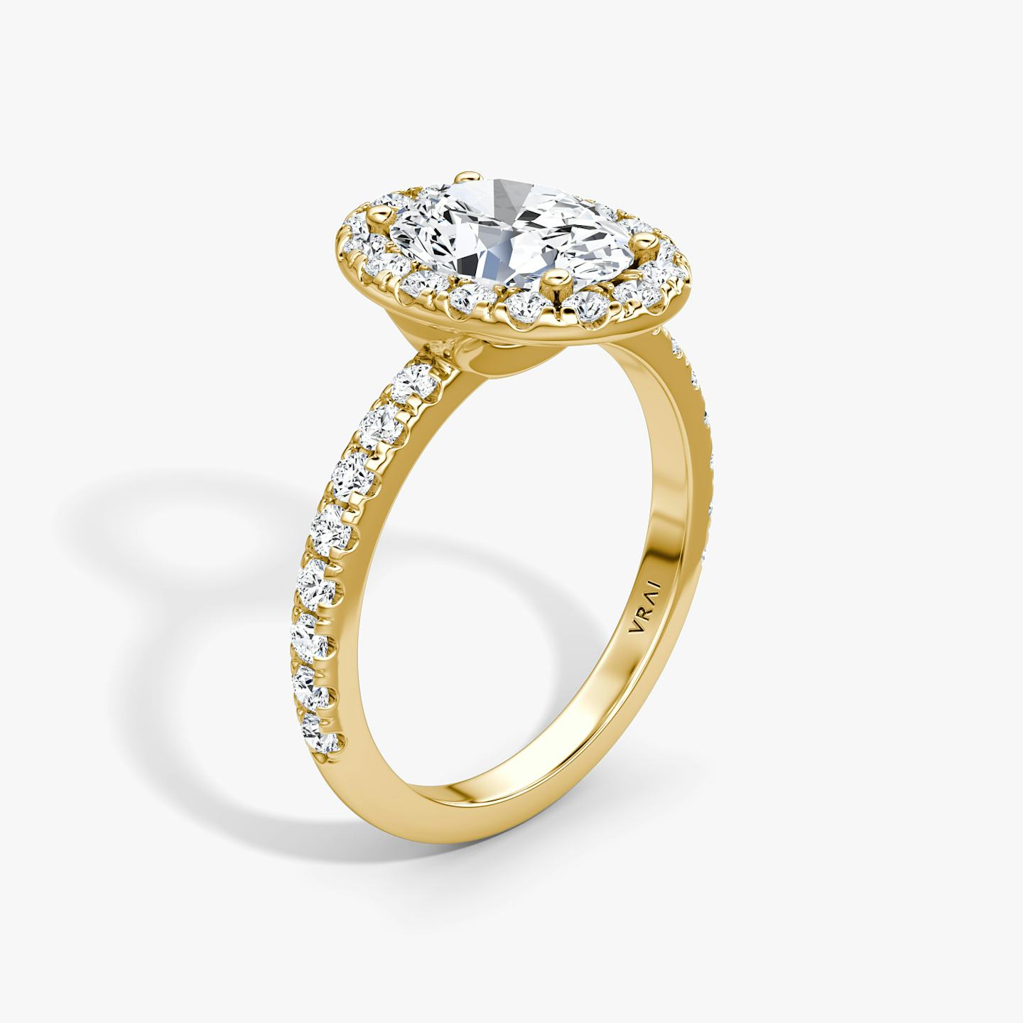 The Halo | Oval | 18k | 18k Yellow Gold | Halo: Large | Band: Pavé | Diamond orientation: vertical | Carat weight: See full inventory