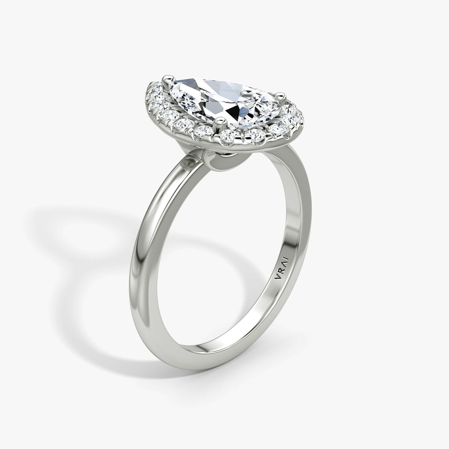 The Halo | Pear | 18k | 18k White Gold | Halo: Large | Band: Plain | Diamond orientation: vertical | Carat weight: See full inventory