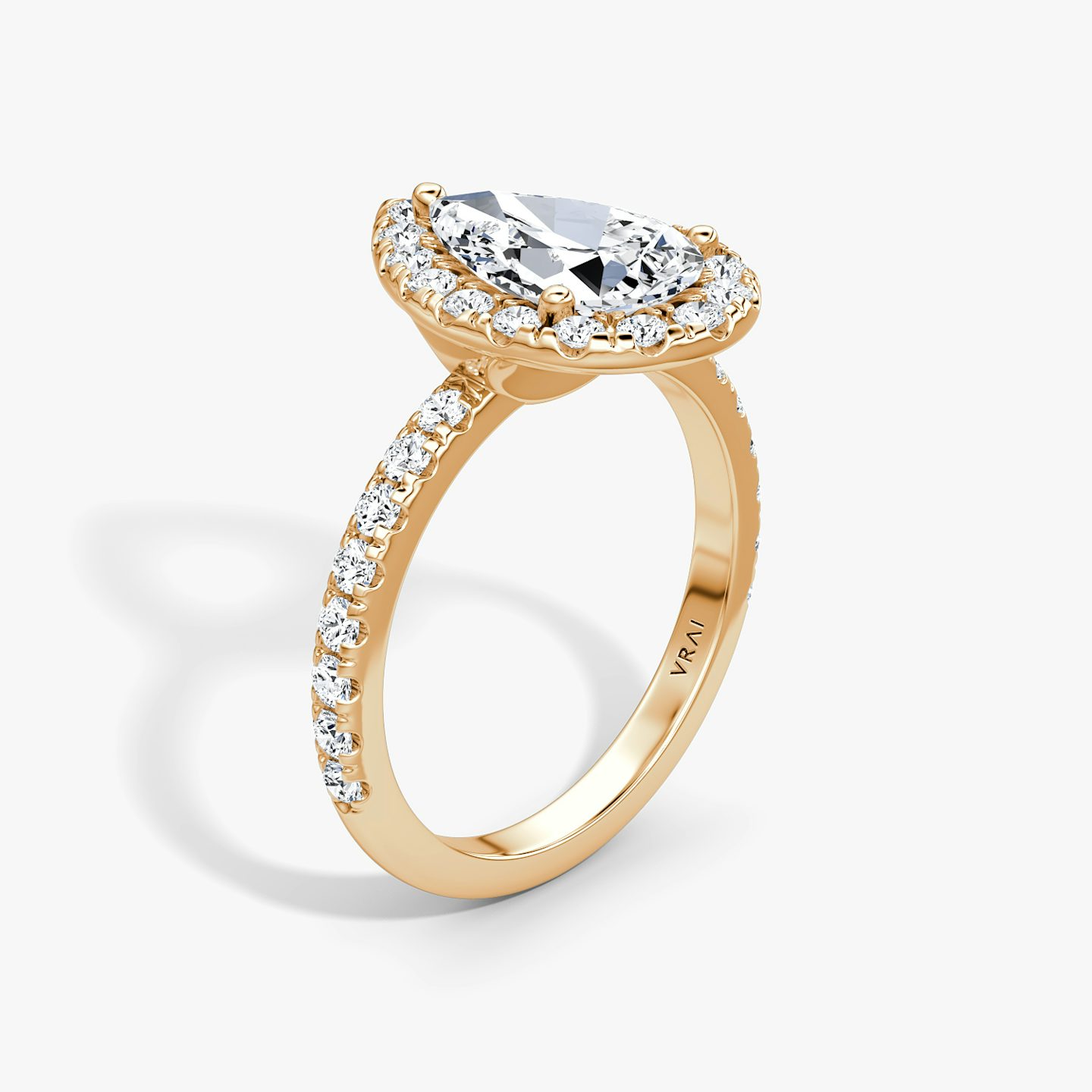 The Halo | Pear | 14k | 14k Rose Gold | Halo: Large | Band: Pavé | Diamond orientation: vertical | Carat weight: See full inventory