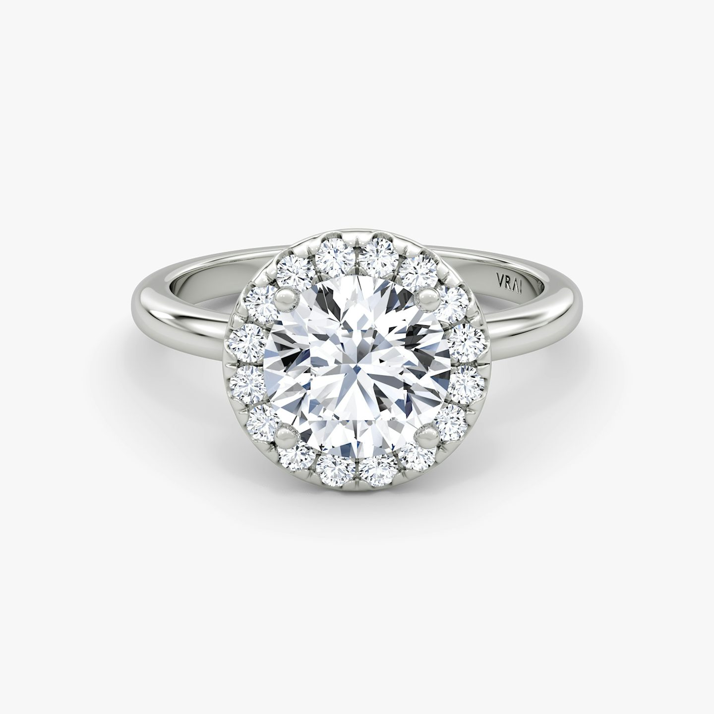 The Halo | Round Brilliant | Platinum | Halo: Large | Band: Plain | Carat weight: See full inventory | Diamond orientation: vertical