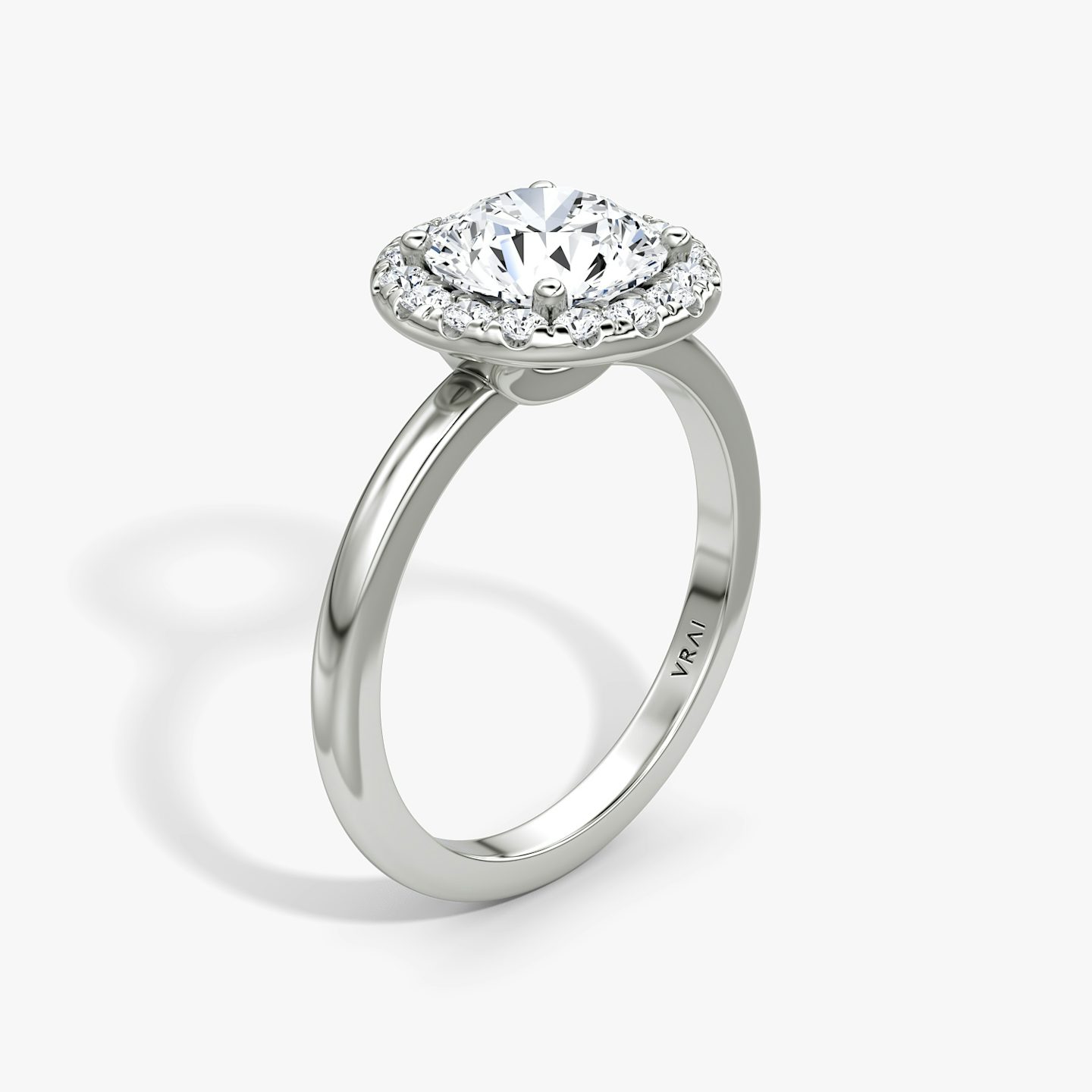 The Halo | Round Brilliant | 18k | 18k White Gold | Halo: Large | Band: Plain | Carat weight: See full inventory | Diamond orientation: vertical