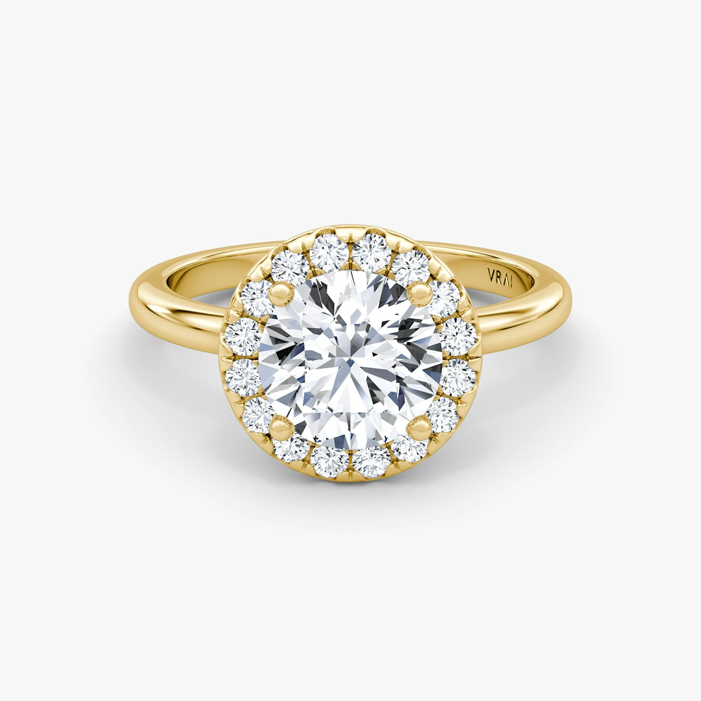 The Halo | Round Brilliant | 18k | 18k Yellow Gold | Halo: Large | Band: Plain | Carat weight: See full inventory | Diamond orientation: vertical