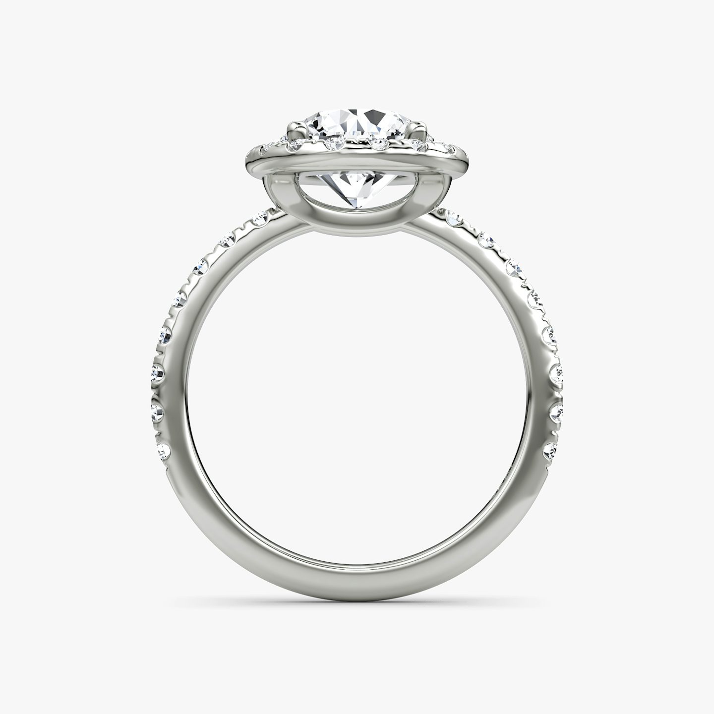 The Halo | Round Brilliant | Platinum | Halo: Large | Band: Pavé | Carat weight: See full inventory | Diamond orientation: vertical