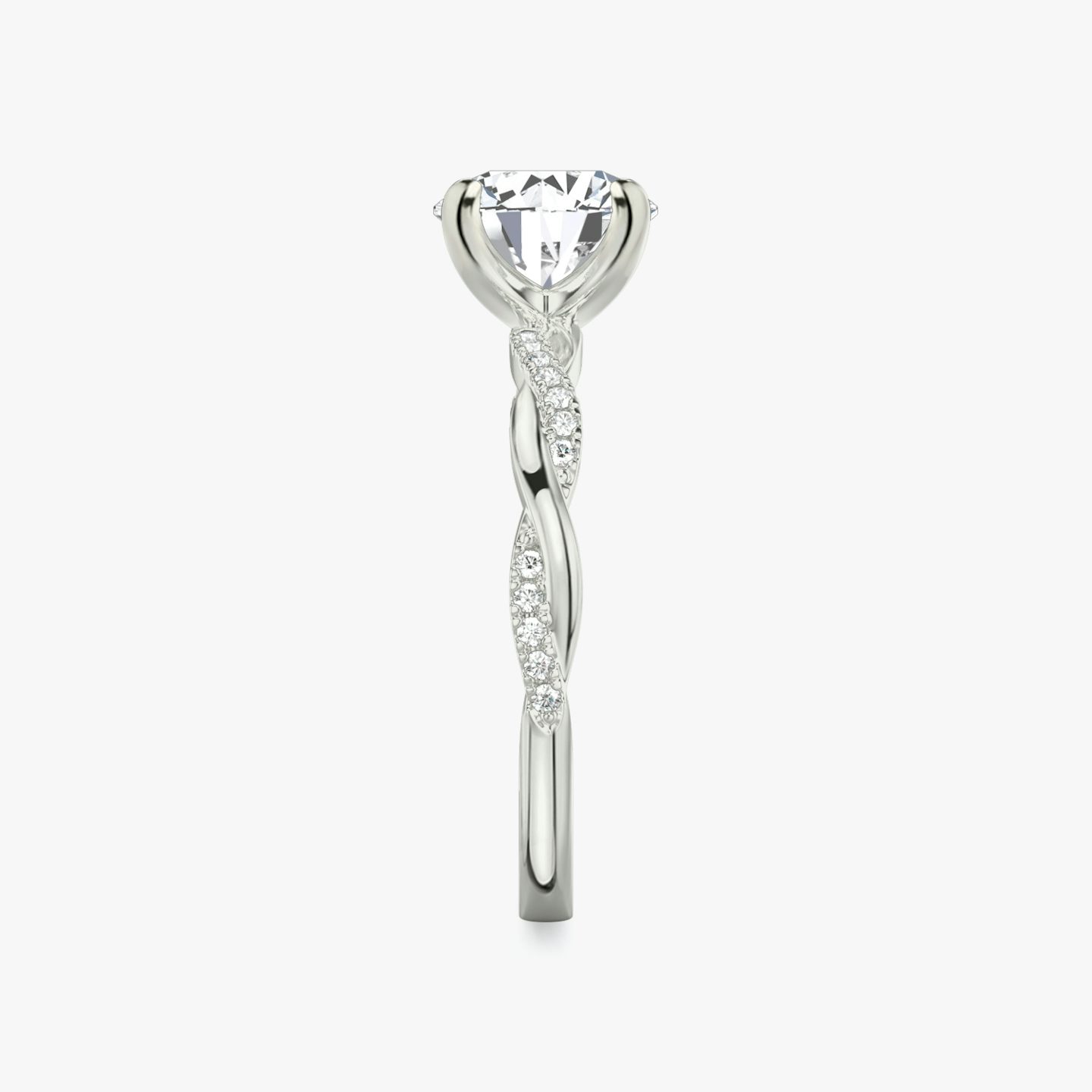 The Twisted Classic | Round Brilliant | Platinum | Band: Pavé | Carat weight: See full inventory | Diamond orientation: vertical