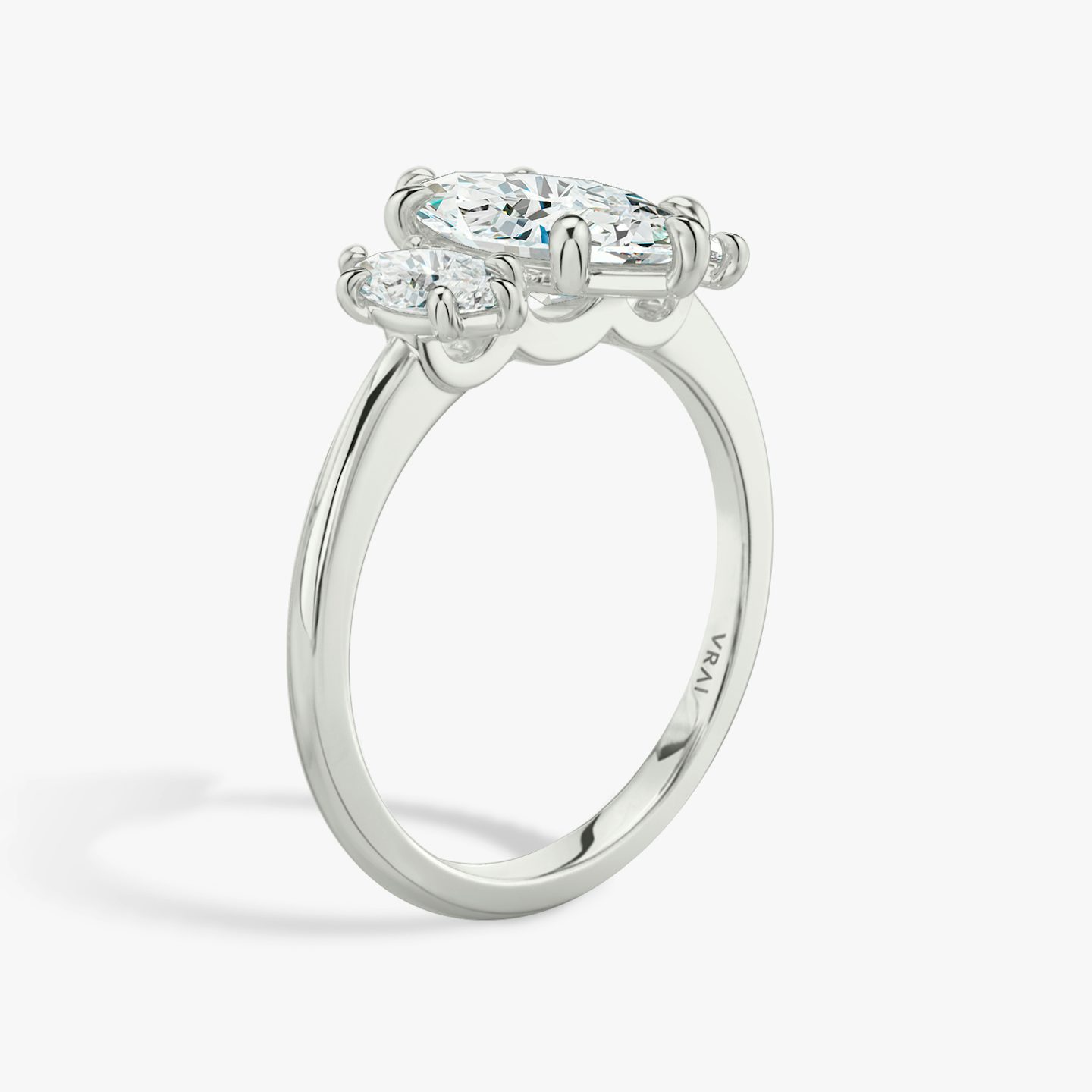 The Three Stone | Pavé Marquise | Platinum | Band: Plain | Side stone carat: 1/4 | Side stone shape: Pavé Marquise | Diamond orientation: vertical | Carat weight: See full inventory