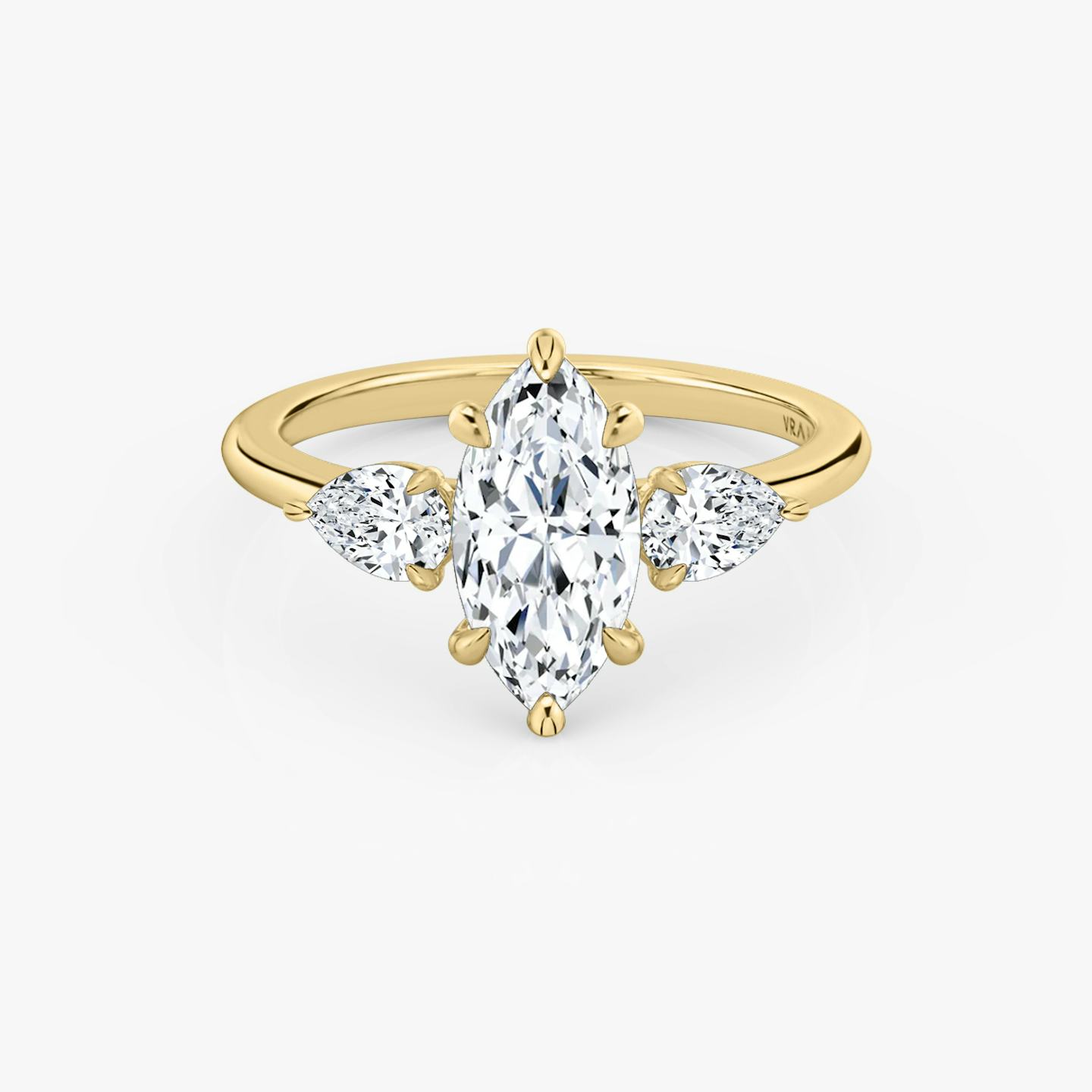 The Three Stone | Pavé Marquise | 18k | 18k Yellow Gold | Band: Plain | Side stone carat: 1/4 | Side stone shape: Pear | Diamond orientation: vertical | Carat weight: See full inventory