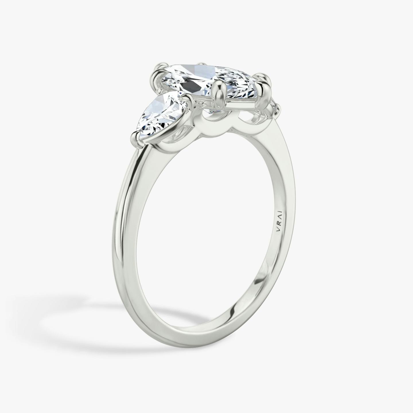 The Three Stone | Pavé Marquise | 18k | 18k White Gold | Band: Plain | Side stone carat: 1/4 | Side stone shape: Pear | Diamond orientation: vertical | Carat weight: See full inventory