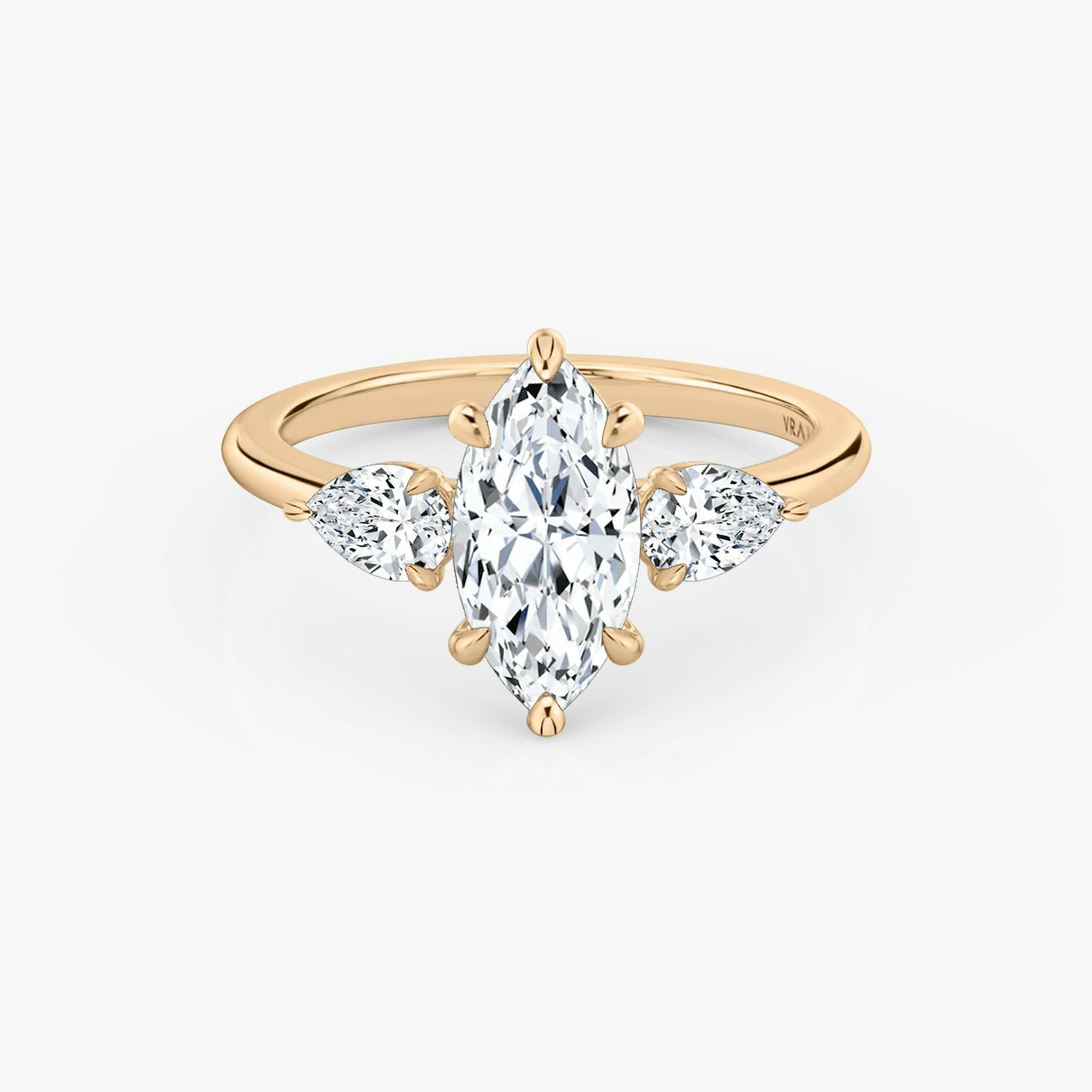 The Three Stone | Pavé Marquise | 14k | 14k Rose Gold | Band: Plain | Side stone carat: 1/4 | Side stone shape: Pear | Diamond orientation: vertical | Carat weight: See full inventory