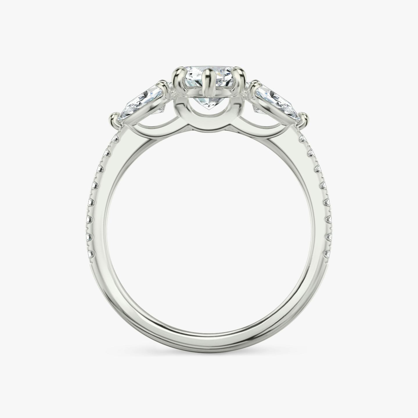 The Three Stone | Pavé Marquise | Platinum | Band: Pavé | Side stone carat: 1/4 | Side stone shape: Pear | Diamond orientation: vertical | Carat weight: See full inventory