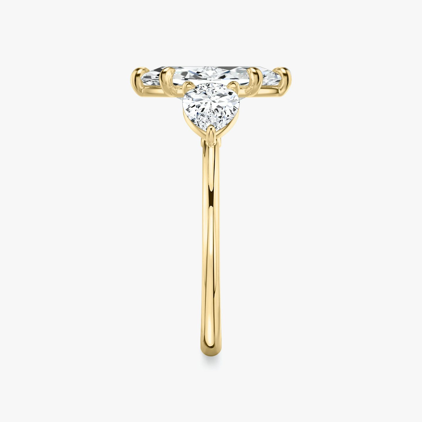 The Three Stone | Pavé Marquise | 18k | 18k Yellow Gold | Band: Plain | Side stone carat: 1/2 | Side stone shape: Pear | Diamond orientation: vertical | Carat weight: See full inventory