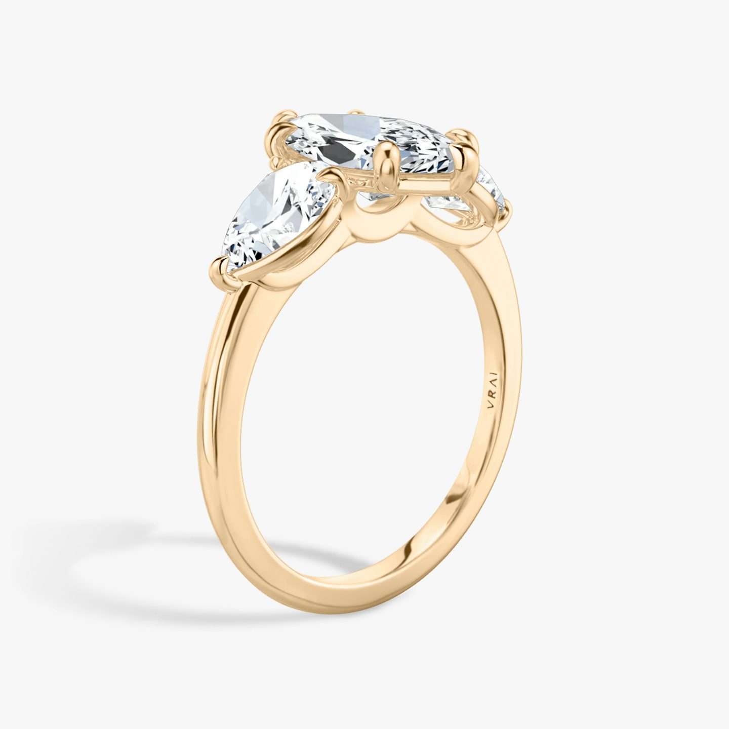The Three Stone | Pavé Marquise | 14k | 14k Rose Gold | Band: Plain | Side stone carat: 1/2 | Side stone shape: Pear | Diamond orientation: vertical | Carat weight: See full inventory