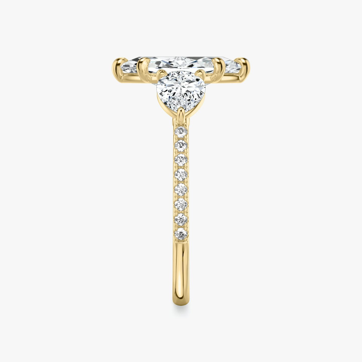 The Three Stone | Pavé Marquise | 18k | 18k Yellow Gold | Band: Pavé | Side stone carat: 1/2 | Side stone shape: Pear | Diamond orientation: vertical | Carat weight: See full inventory
