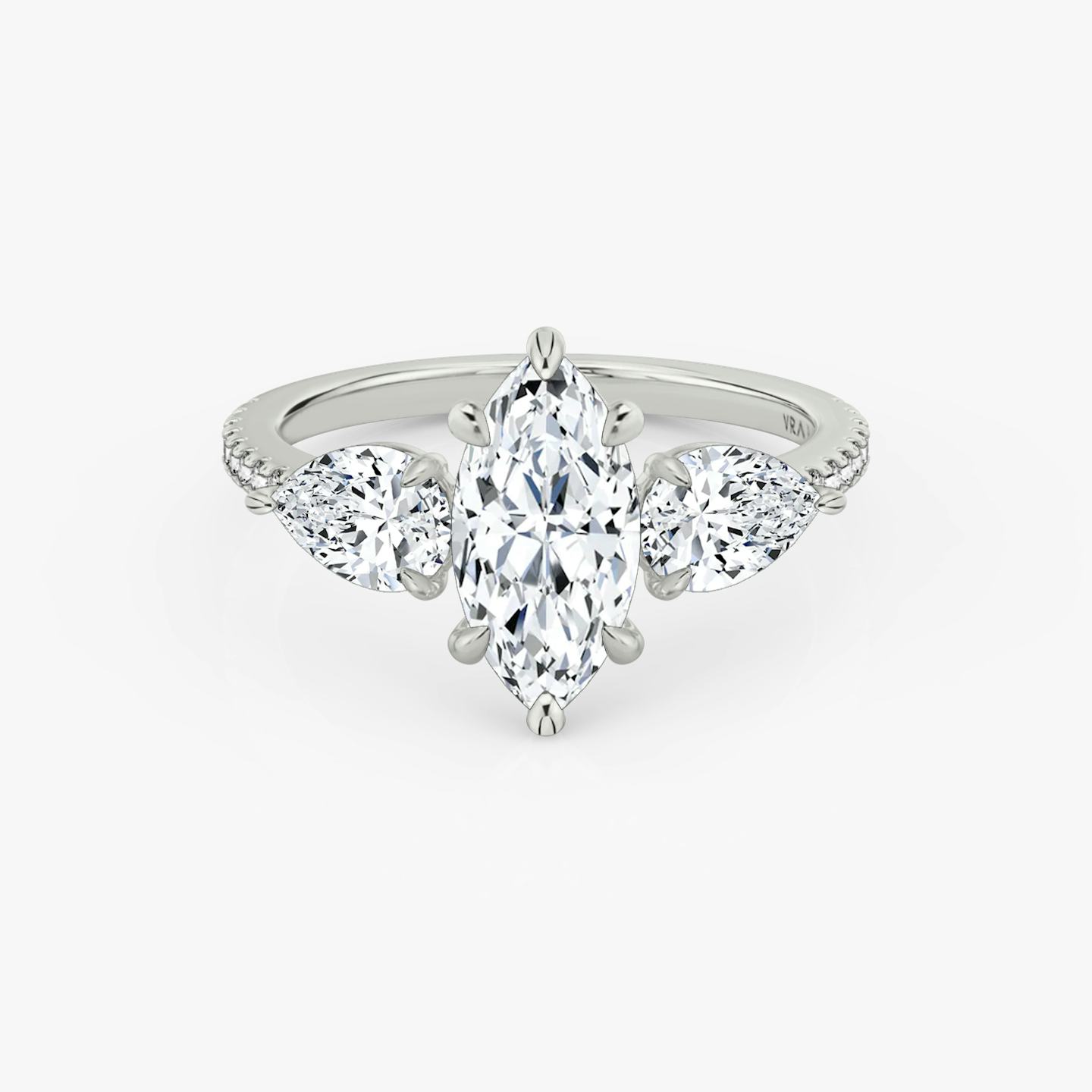 The Three Stone | Pavé Marquise | Platinum | Band: Pavé | Side stone carat: 1/2 | Side stone shape: Pear | Diamond orientation: vertical | Carat weight: See full inventory