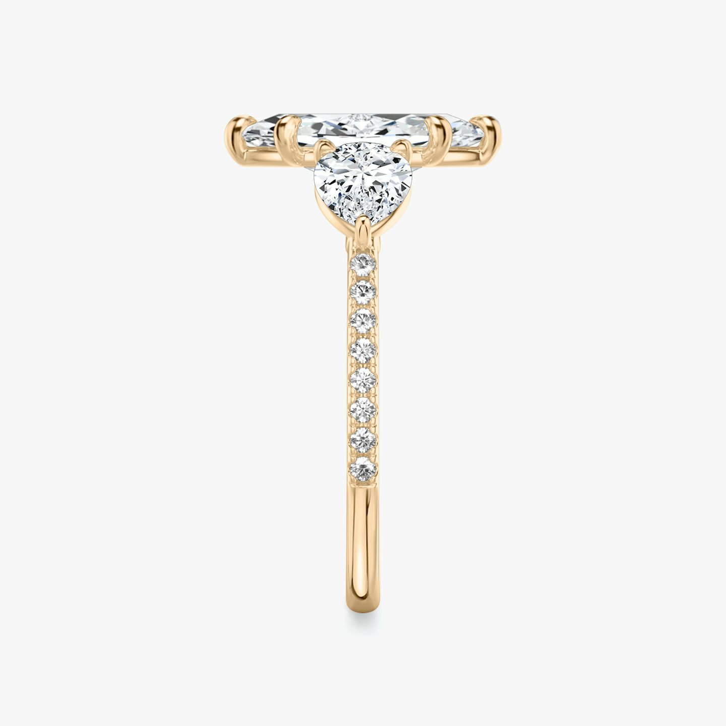 The Three Stone | Pavé Marquise | 14k | 14k Rose Gold | Band: Pavé | Side stone carat: 1/2 | Side stone shape: Pear | Diamond orientation: vertical | Carat weight: See full inventory