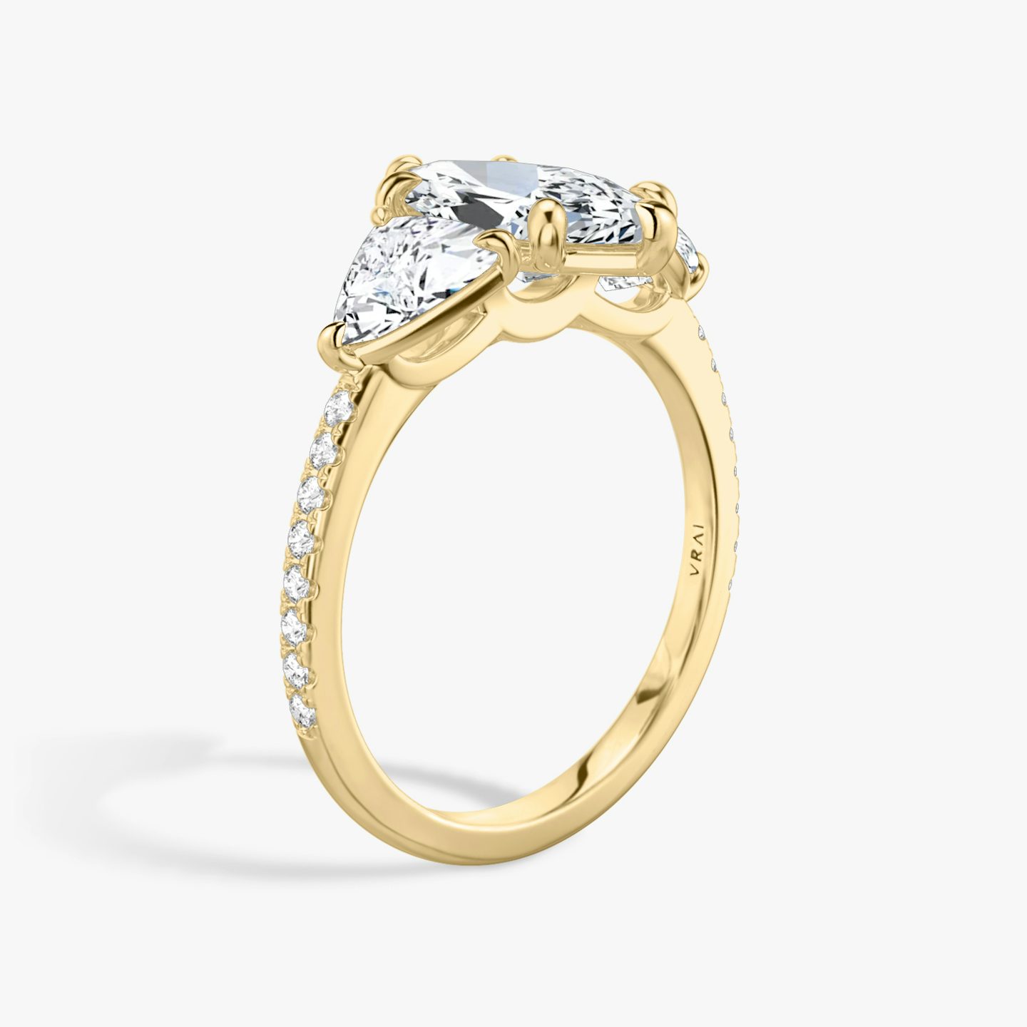 The Three Stone | Pavé Marquise | 18k | 18k Yellow Gold | Band: Pavé | Side stone carat: 1/2 | Side stone shape: Trillion | Diamond orientation: vertical | Carat weight: See full inventory