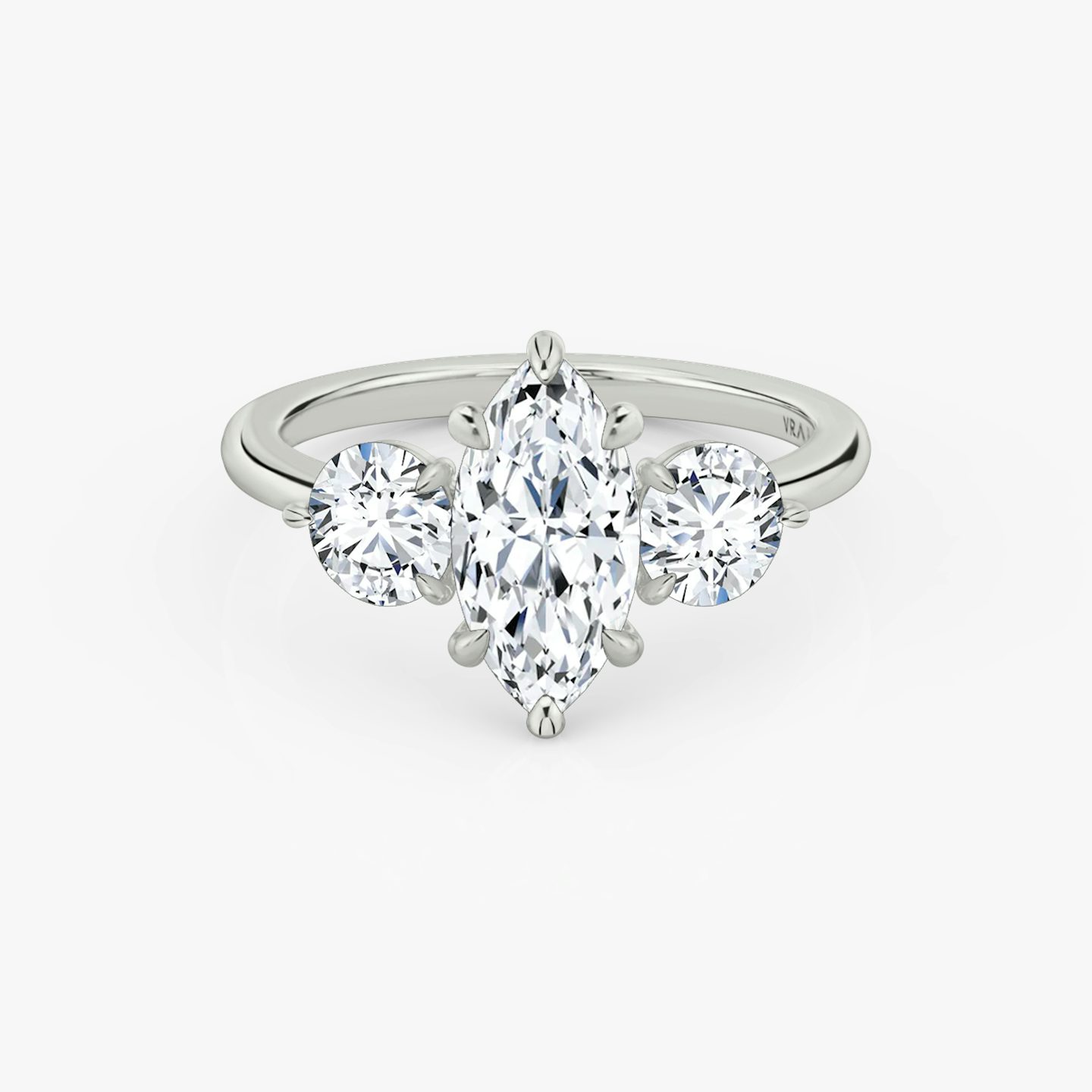 The Three Stone | Pavé Marquise | Platinum | Band: Plain | Side stone carat: 1/2 | Side stone shape: Round Brilliant | Diamond orientation: vertical | Carat weight: See full inventory