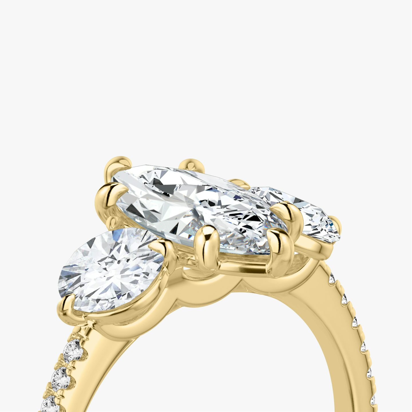 The Three Stone | Pavé Marquise | 18k | 18k Yellow Gold | Band: Pavé | Side stone carat: 1/2 | Side stone shape: Round Brilliant | Diamond orientation: vertical | Carat weight: See full inventory