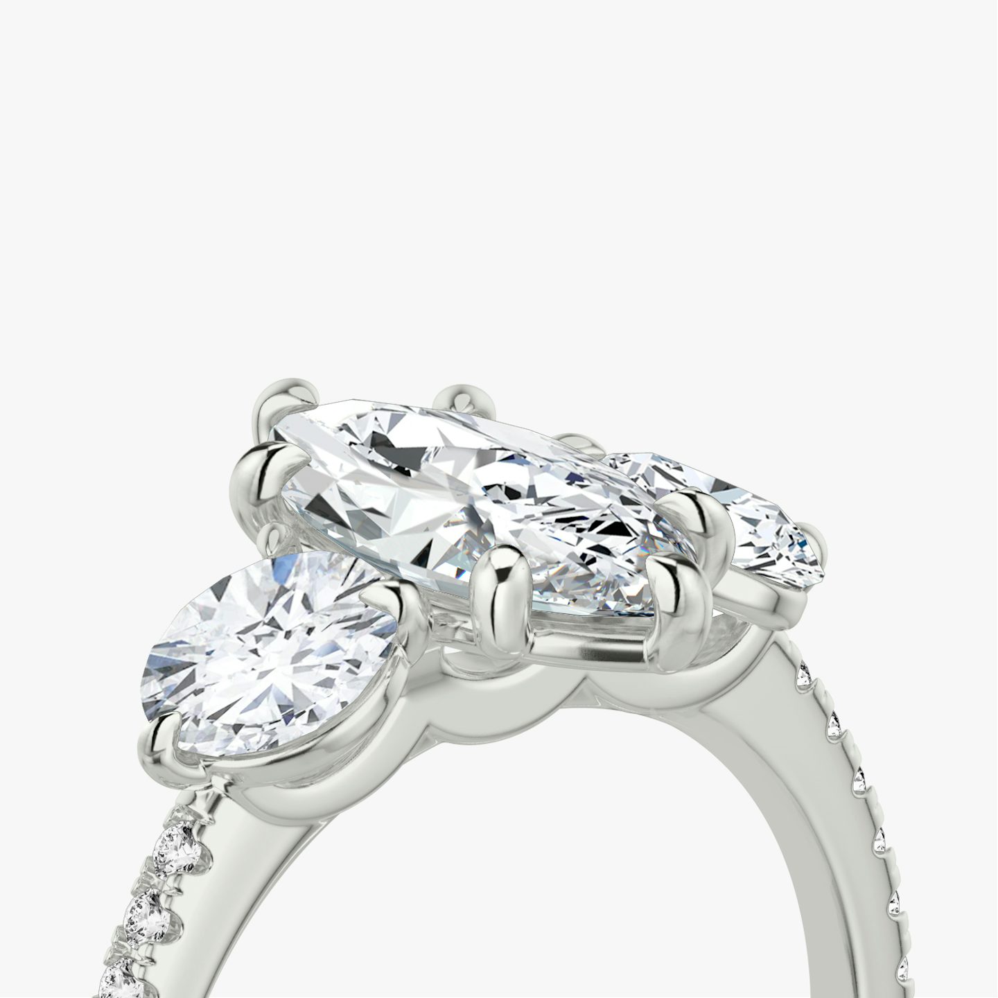 The Three Stone | Pavé Marquise | 18k | 18k White Gold | Band: Pavé | Side stone carat: 1/2 | Side stone shape: Round Brilliant | Diamond orientation: vertical | Carat weight: See full inventory