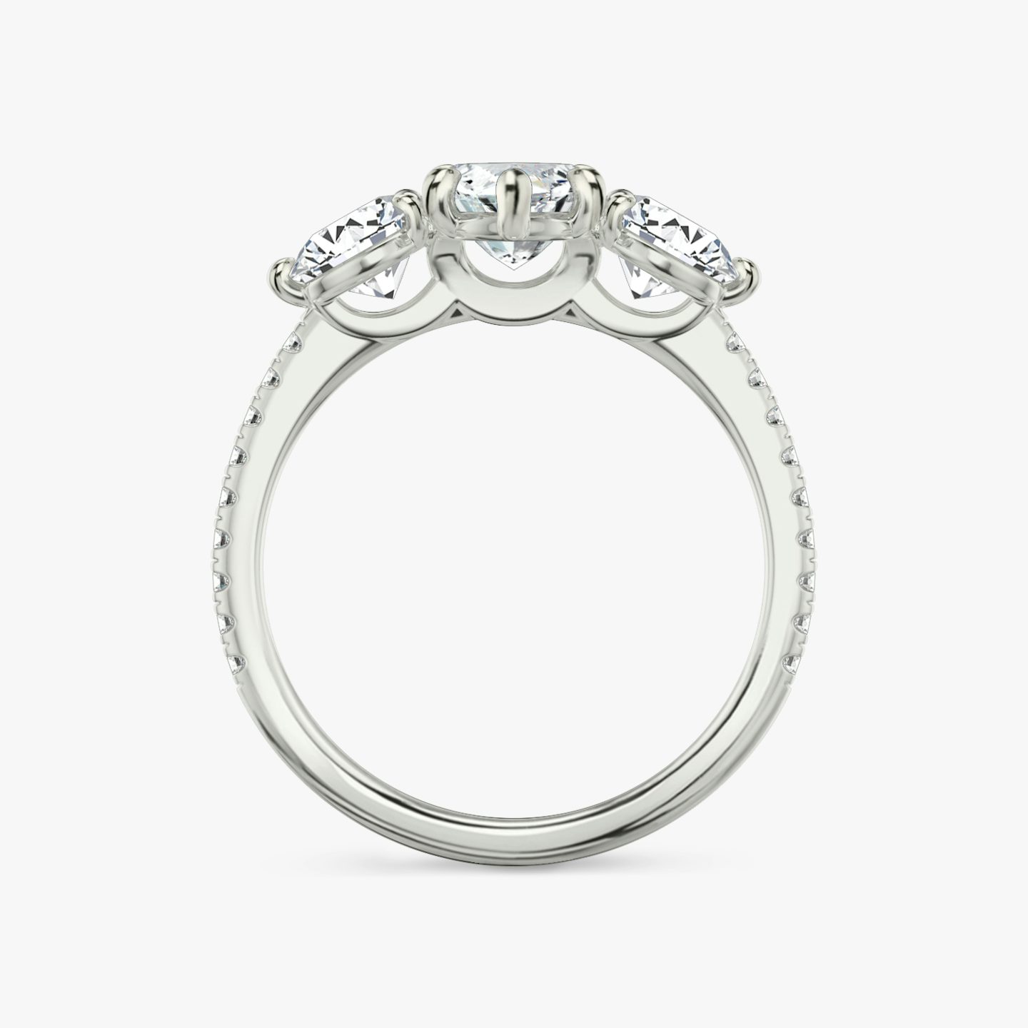 The Three Stone | Pavé Marquise | Platinum | Band: Pavé | Side stone carat: 1/2 | Side stone shape: Round Brilliant | Diamond orientation: vertical | Carat weight: See full inventory