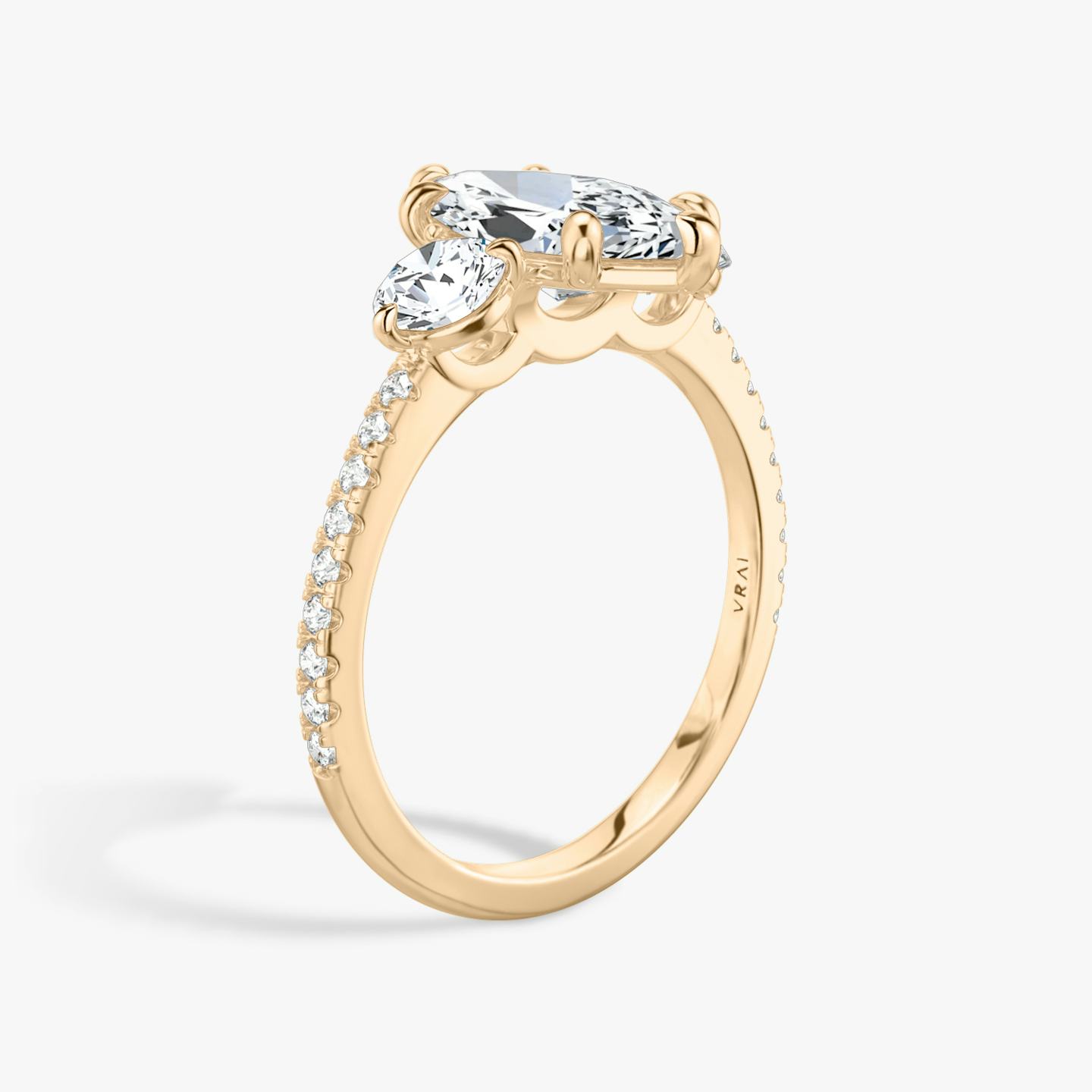 The Three Stone | Pavé Marquise | 14k | 14k Rose Gold | Band: Pavé | Side stone carat: 1/4 | Side stone shape: Round Brilliant | Diamond orientation: vertical | Carat weight: See full inventory