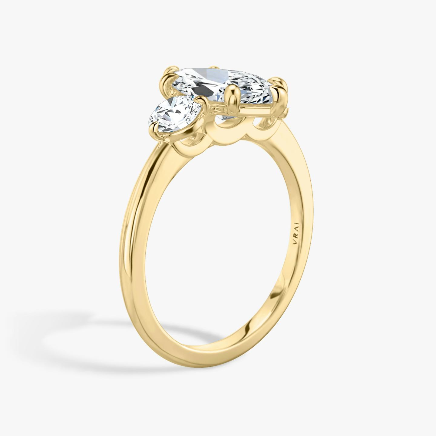 The Three Stone | Pavé Marquise | 18k | 18k Yellow Gold | Band: Plain | Side stone carat: 1/4 | Side stone shape: Round Brilliant | Diamond orientation: vertical | Carat weight: See full inventory
