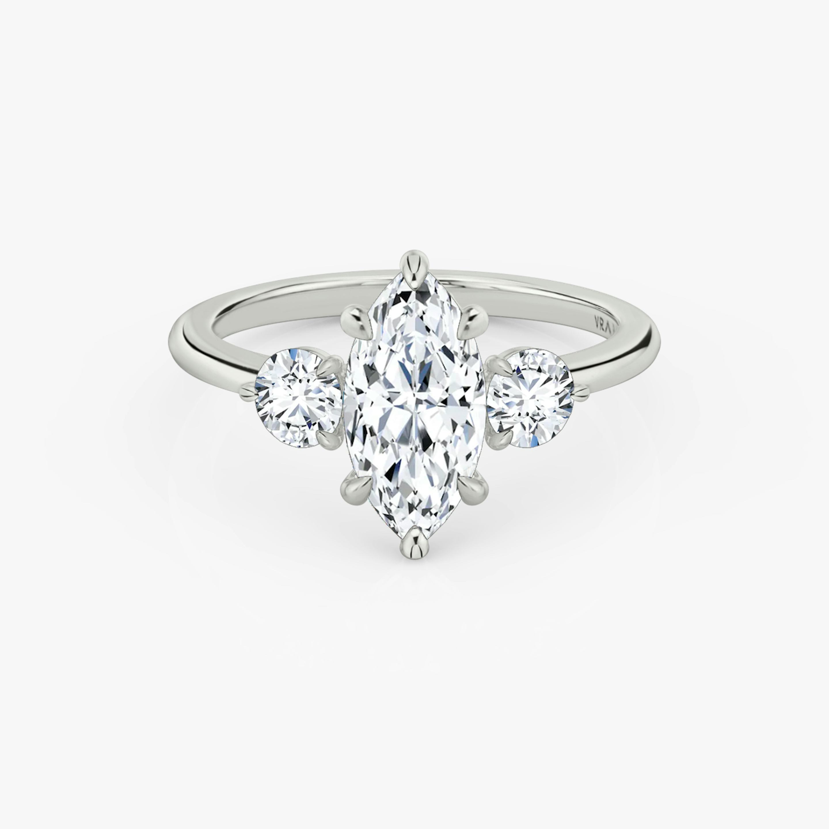 The Three Stone | Pavé Marquise | Platinum | Band: Plain | Side stone carat: 1/4 | Side stone shape: Round Brilliant | Diamond orientation: vertical | Carat weight: See full inventory