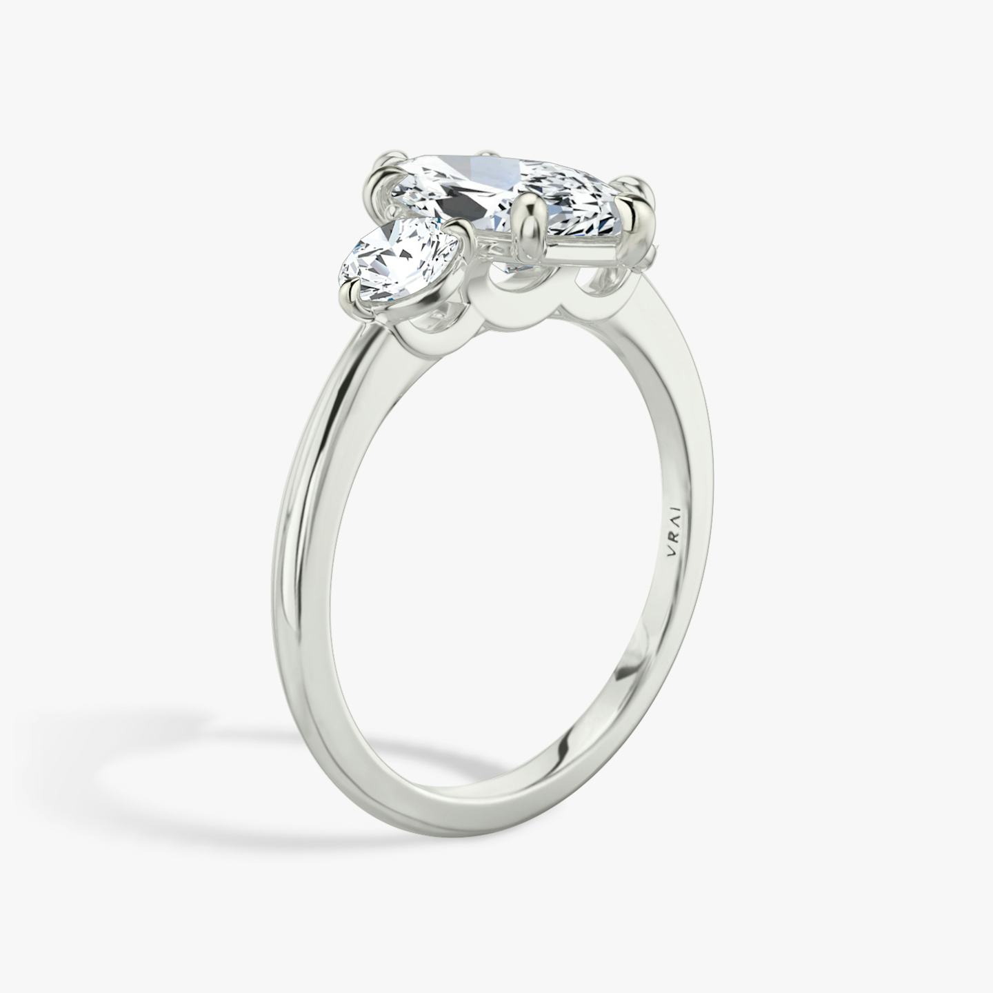 The Three Stone | Pavé Marquise | 18k | 18k White Gold | Band: Plain | Side stone carat: 1/4 | Side stone shape: Round Brilliant | Diamond orientation: vertical | Carat weight: See full inventory