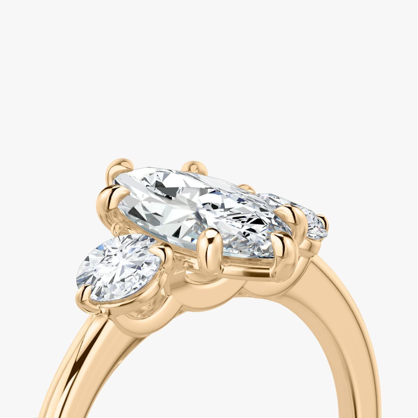 The Three Stone | Pavé Marquise | 14k | 14k Rose Gold | Band: Plain | Side stone carat: 1/4 | Side stone shape: Round Brilliant | Diamond orientation: vertical | Carat weight: See full inventory