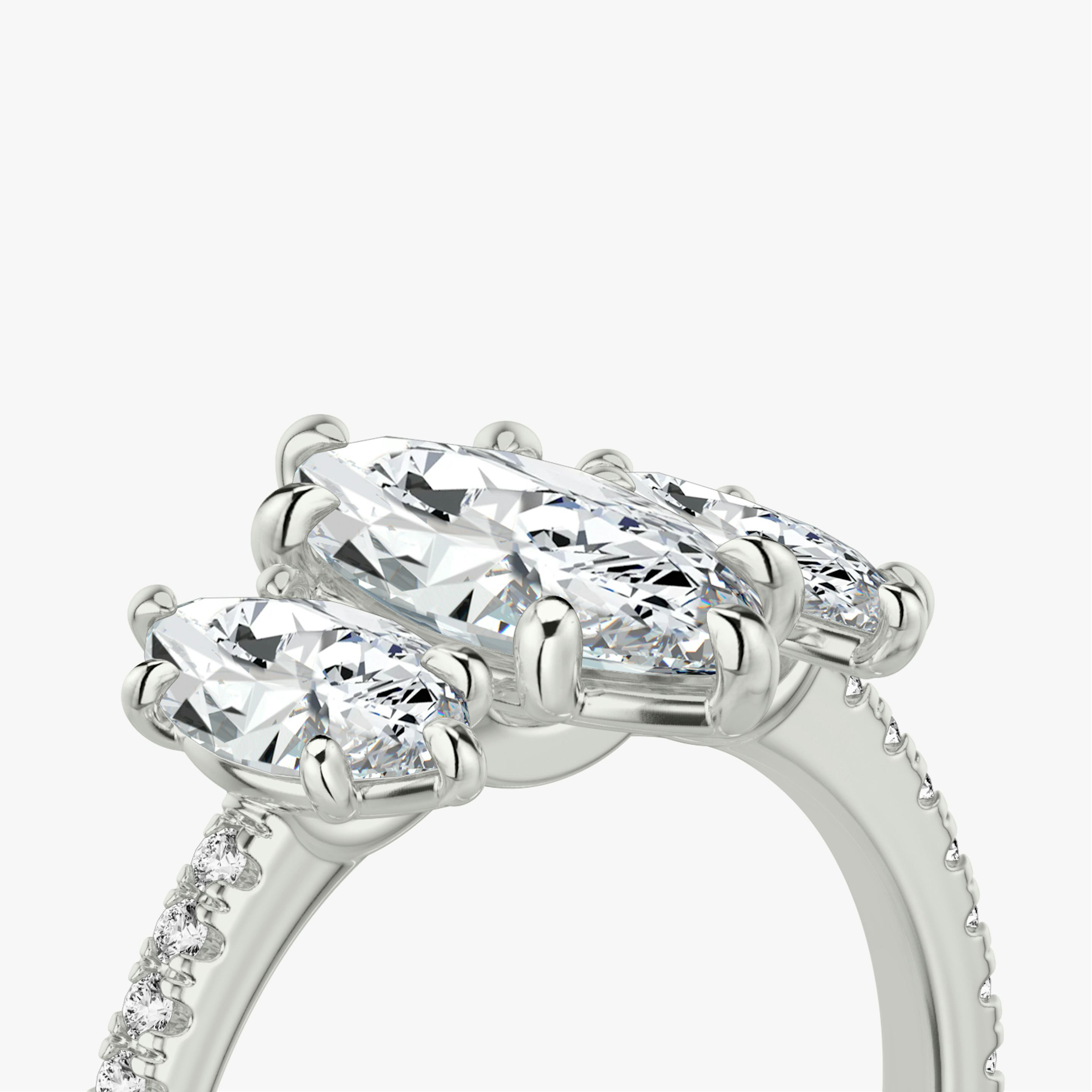 The Three Stone | Pavé Marquise | Platinum | Band: Pavé | Side stone carat: 1/2 | Side stone shape: Pavé Marquise | Diamond orientation: vertical | Carat weight: See full inventory
