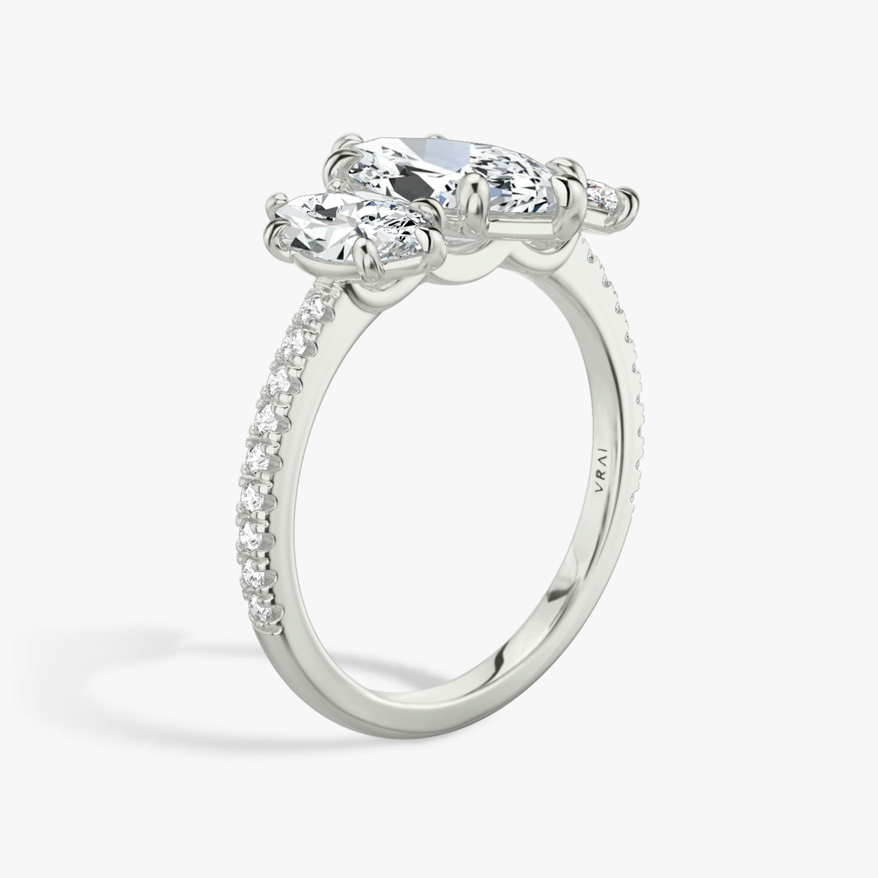 The Three Stone | Pavé Marquise | Platinum | Band: Pavé | Side stone carat: 1/2 | Side stone shape: Pavé Marquise | Diamond orientation: vertical | Carat weight: See full inventory
