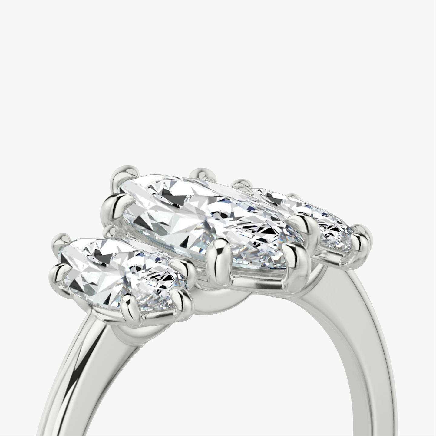 The Three Stone | Pavé Marquise | Platinum | Band: Plain | Side stone carat: 1/2 | Side stone shape: Pavé Marquise | Diamond orientation: vertical | Carat weight: See full inventory
