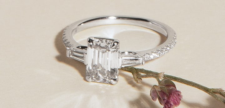 Emerald engagement ring in platinum