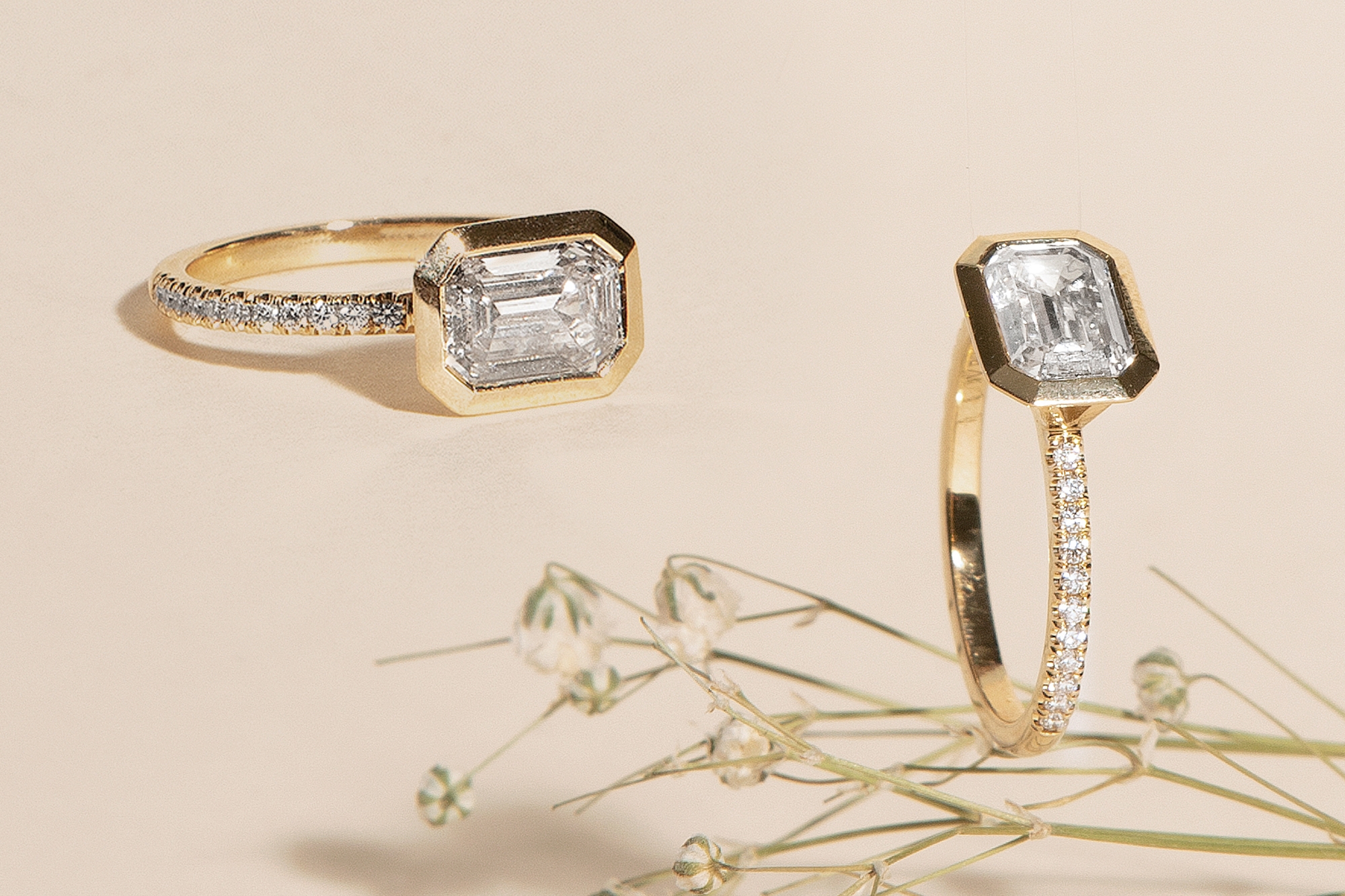 An Elegant Emerald-cut Diamond Ring with side baguettes set in Platinu -  ROSARIA VARRA FINE JEWELRY